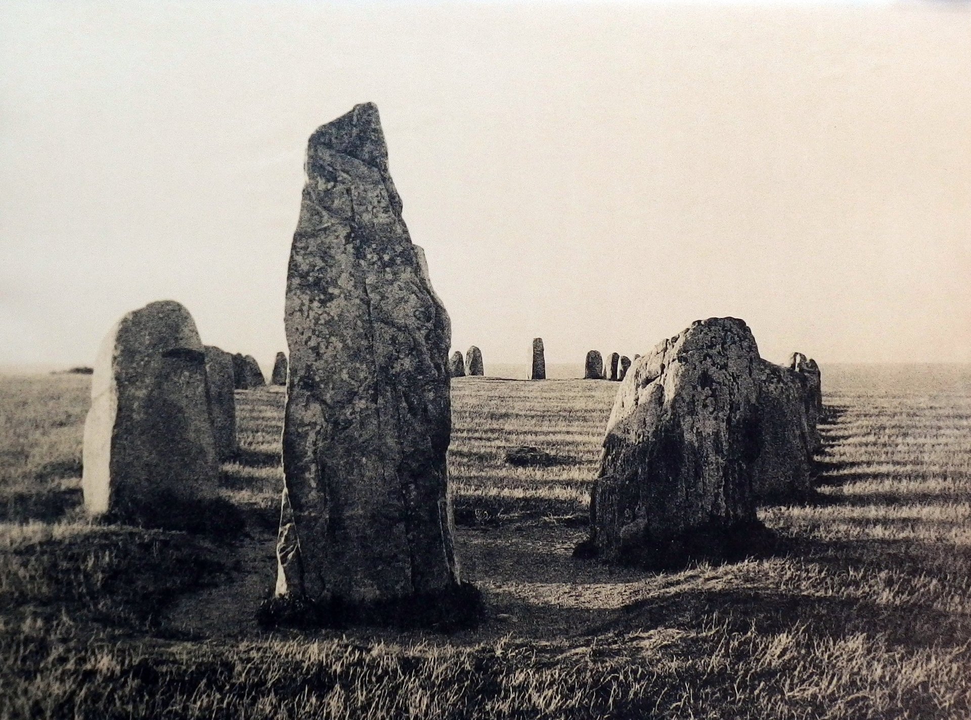black and brown leather padded tub sofa