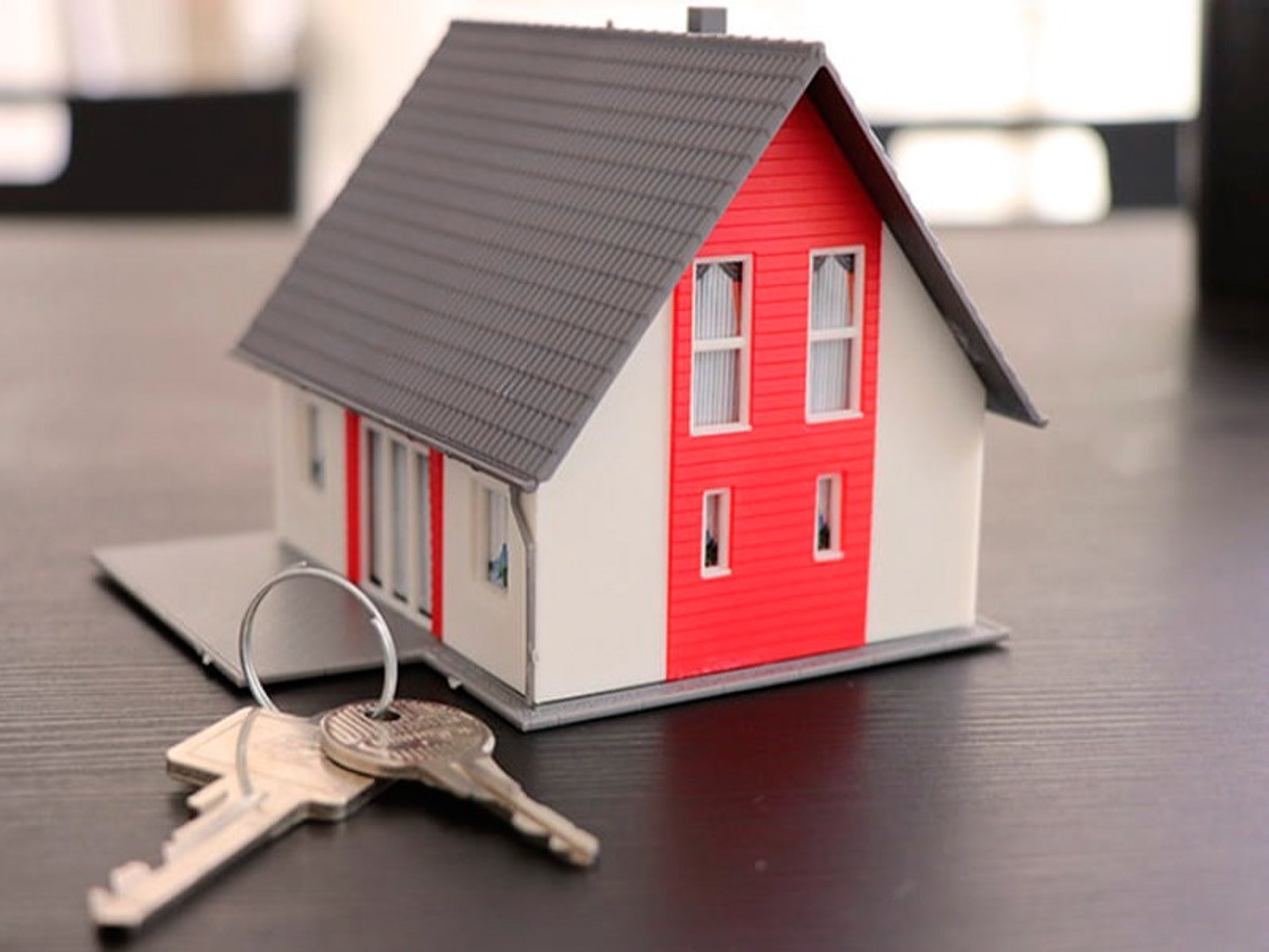 an abstract photo of a curved building with a blue sky in the background