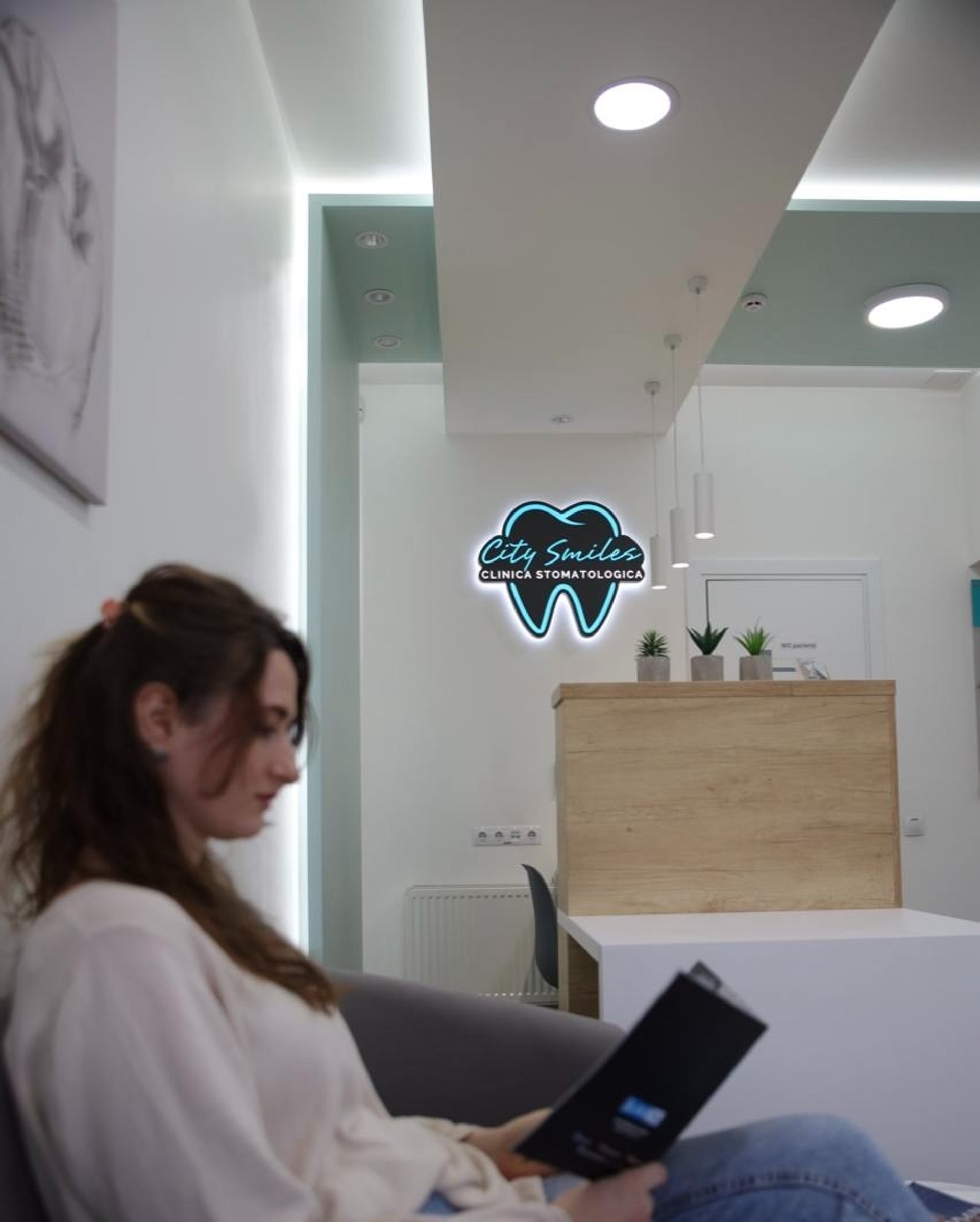 black and brown leather padded tub sofa