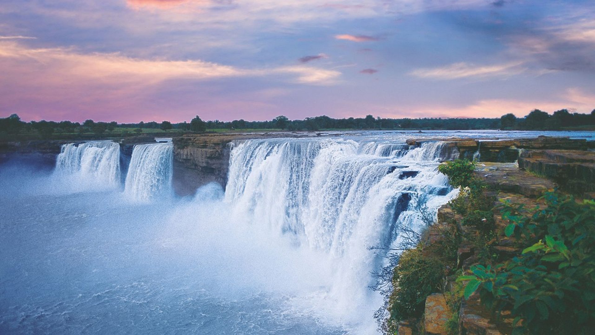 A group of people standing in front of a building