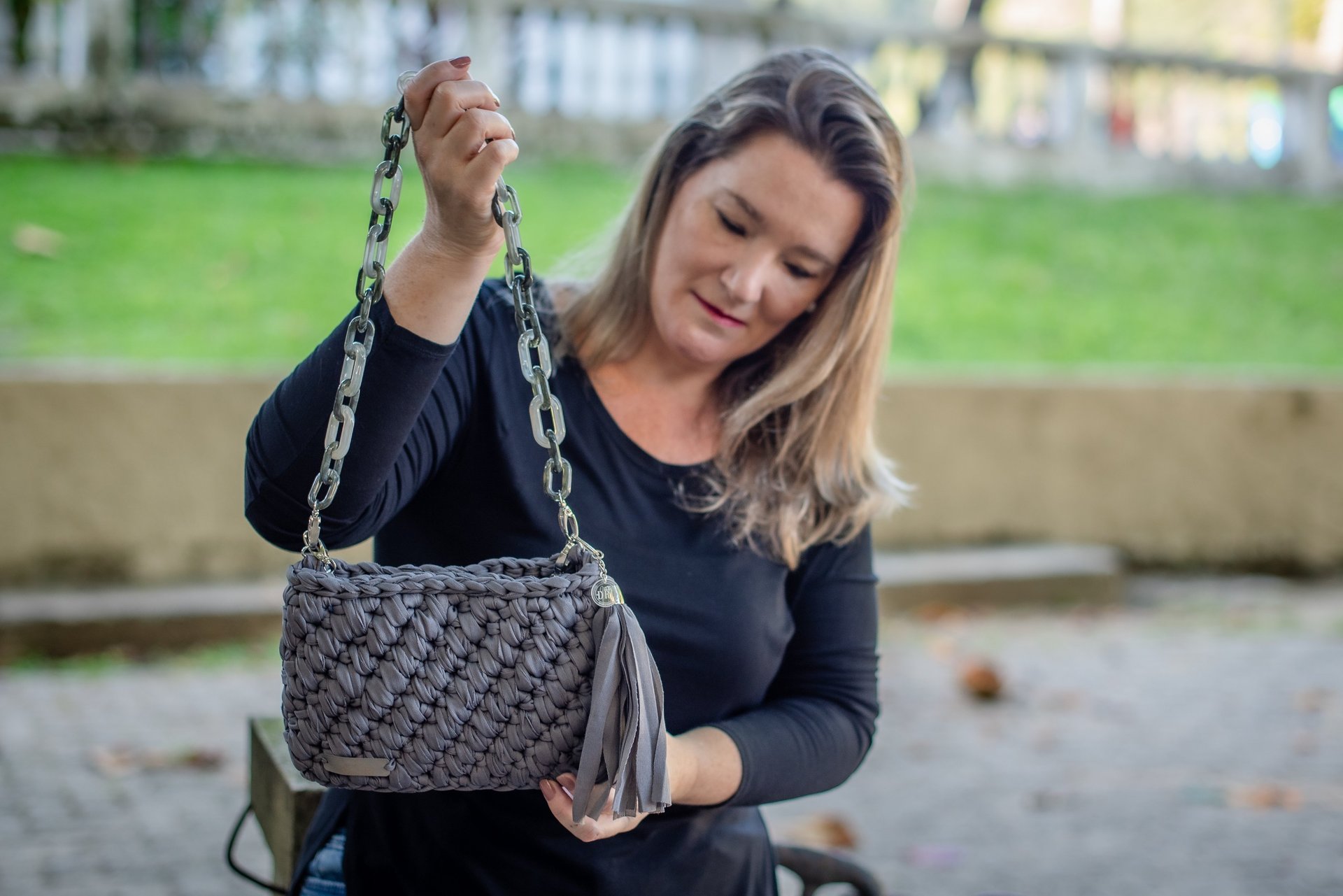 woman wearing yellow long-sleeved dress under white clouds and blue sky during daytime