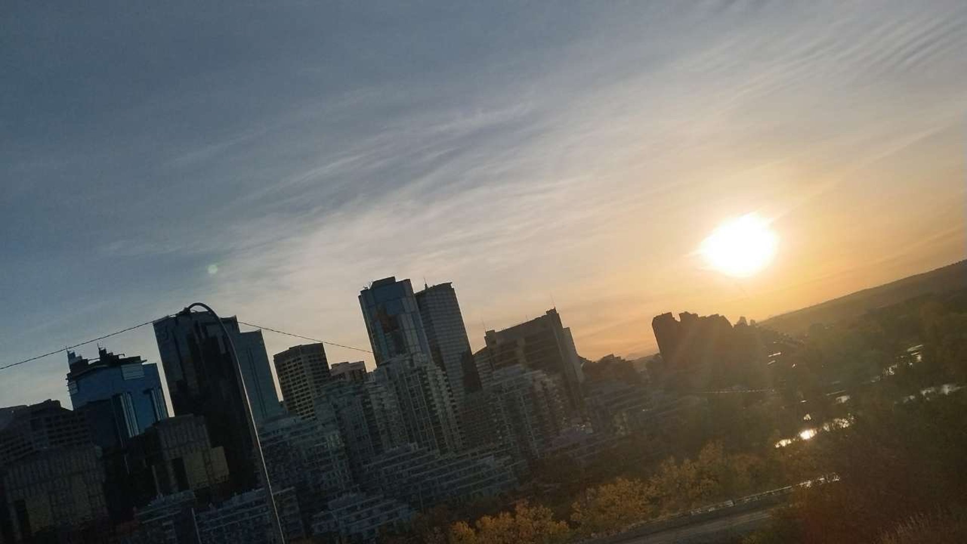 person wearing grey knit sweater