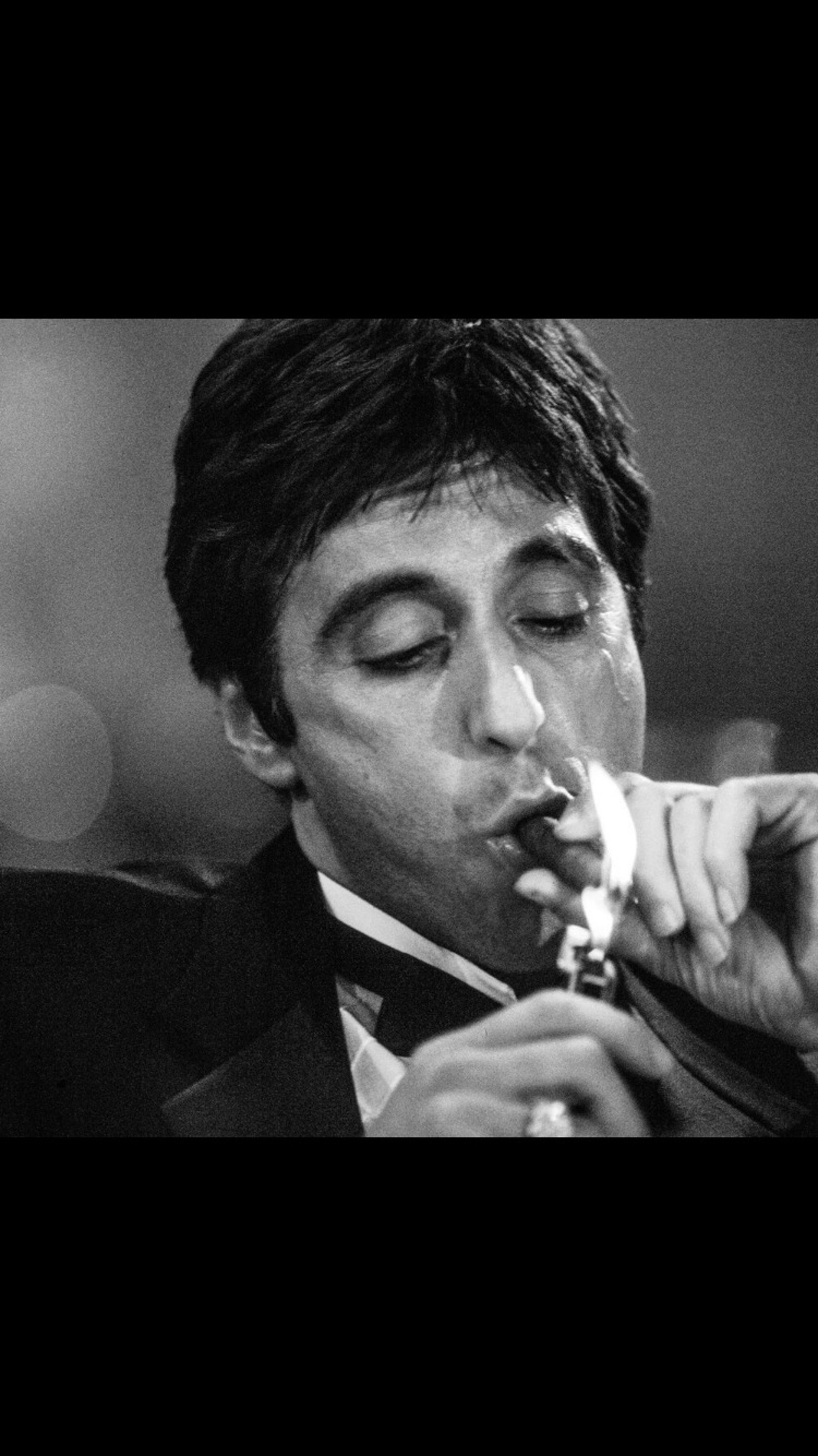 person wearing grey knit sweater