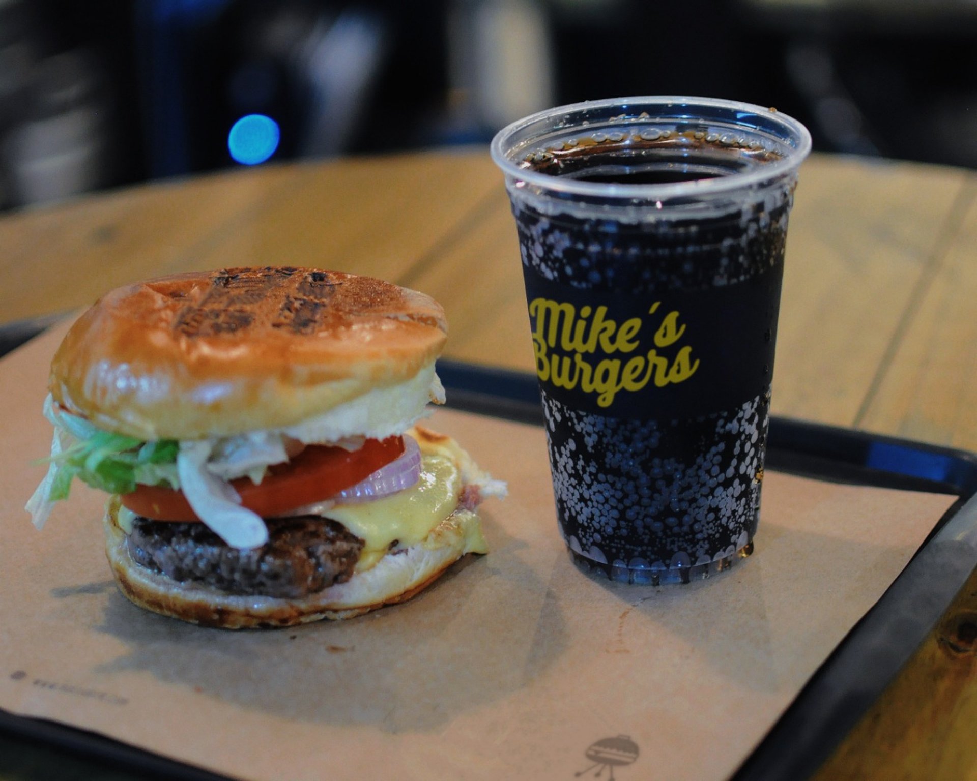 woman wearing yellow long-sleeved dress under white clouds and blue sky during daytime