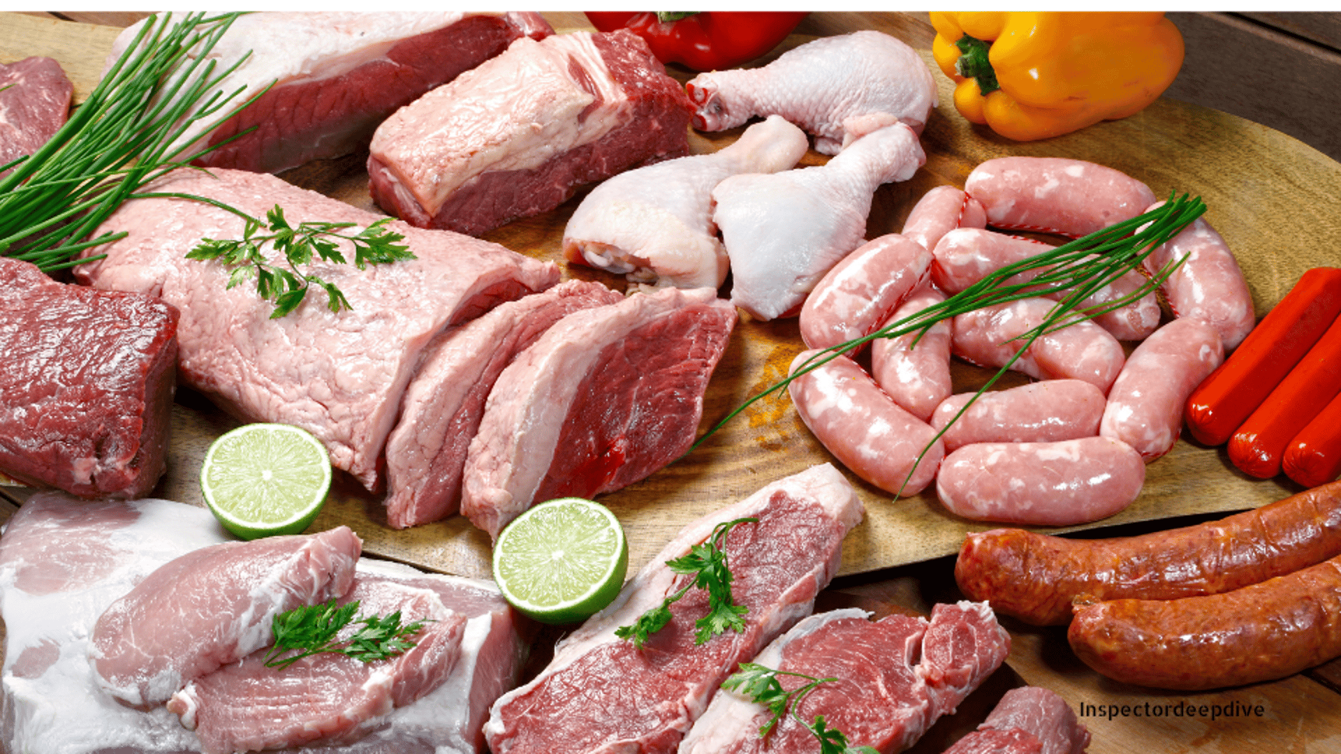 a couple of raw meat on a cutting board
