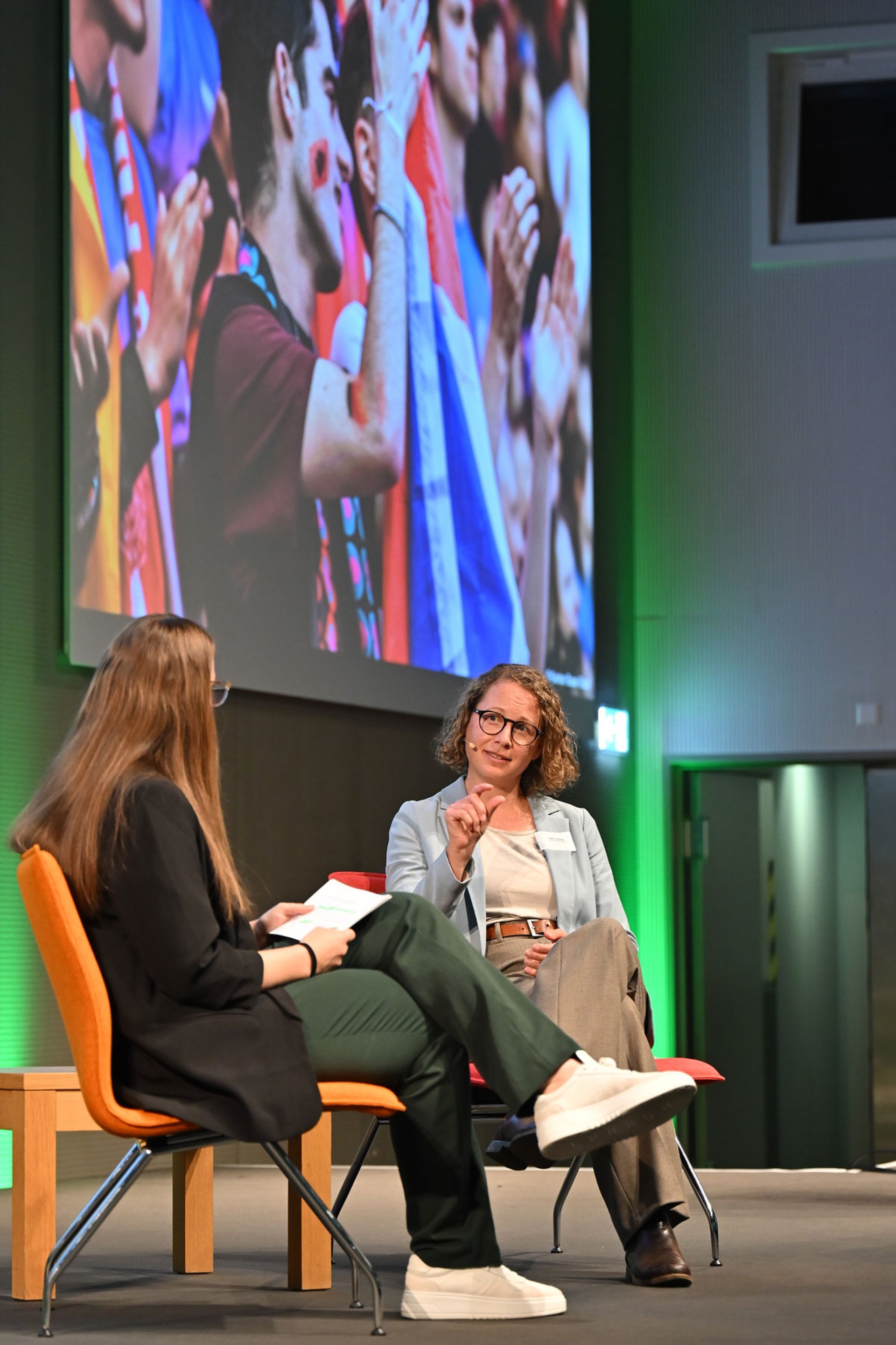 black and brown leather padded tub sofa