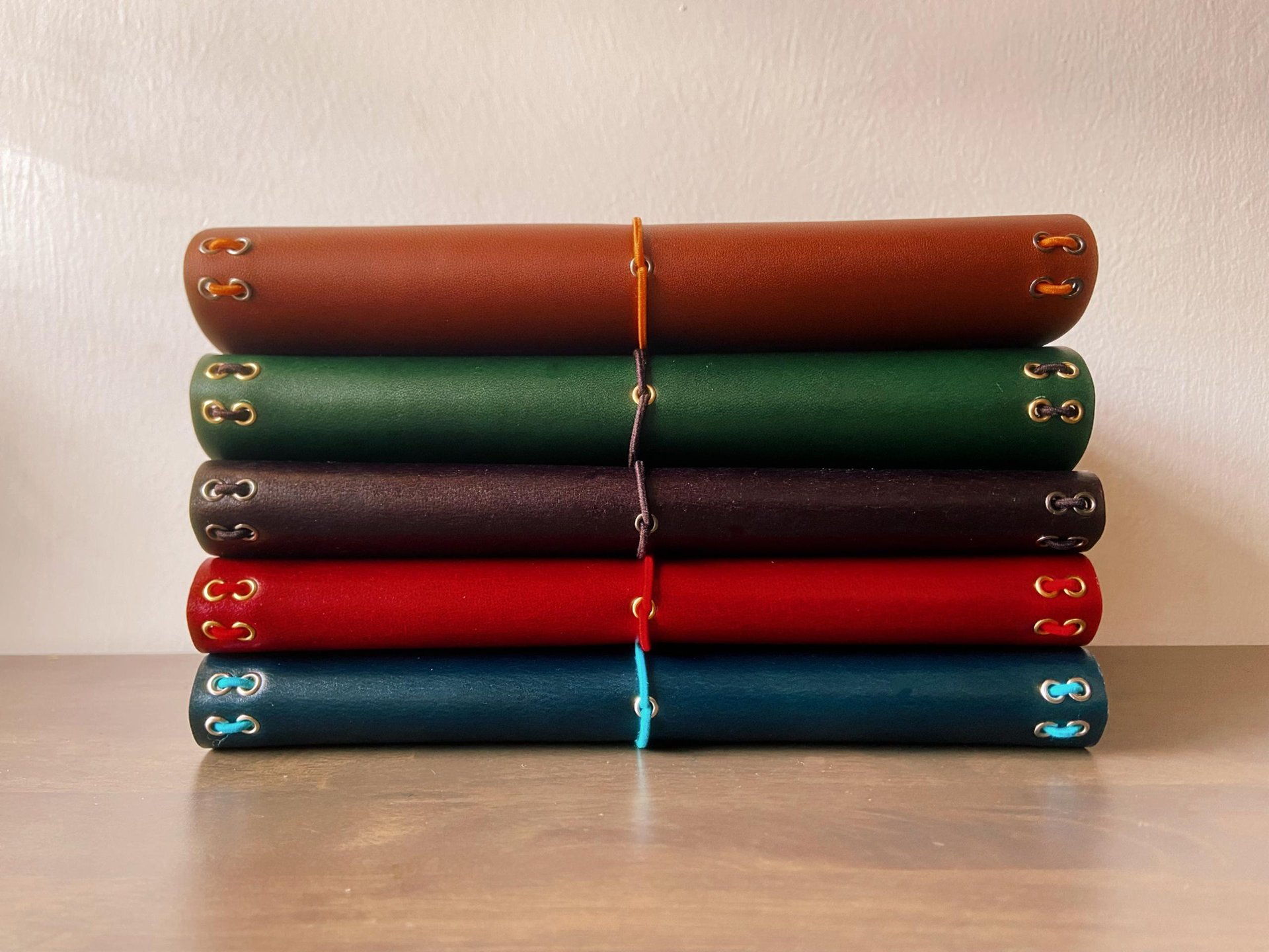 an abstract photo of a curved building with a blue sky in the background