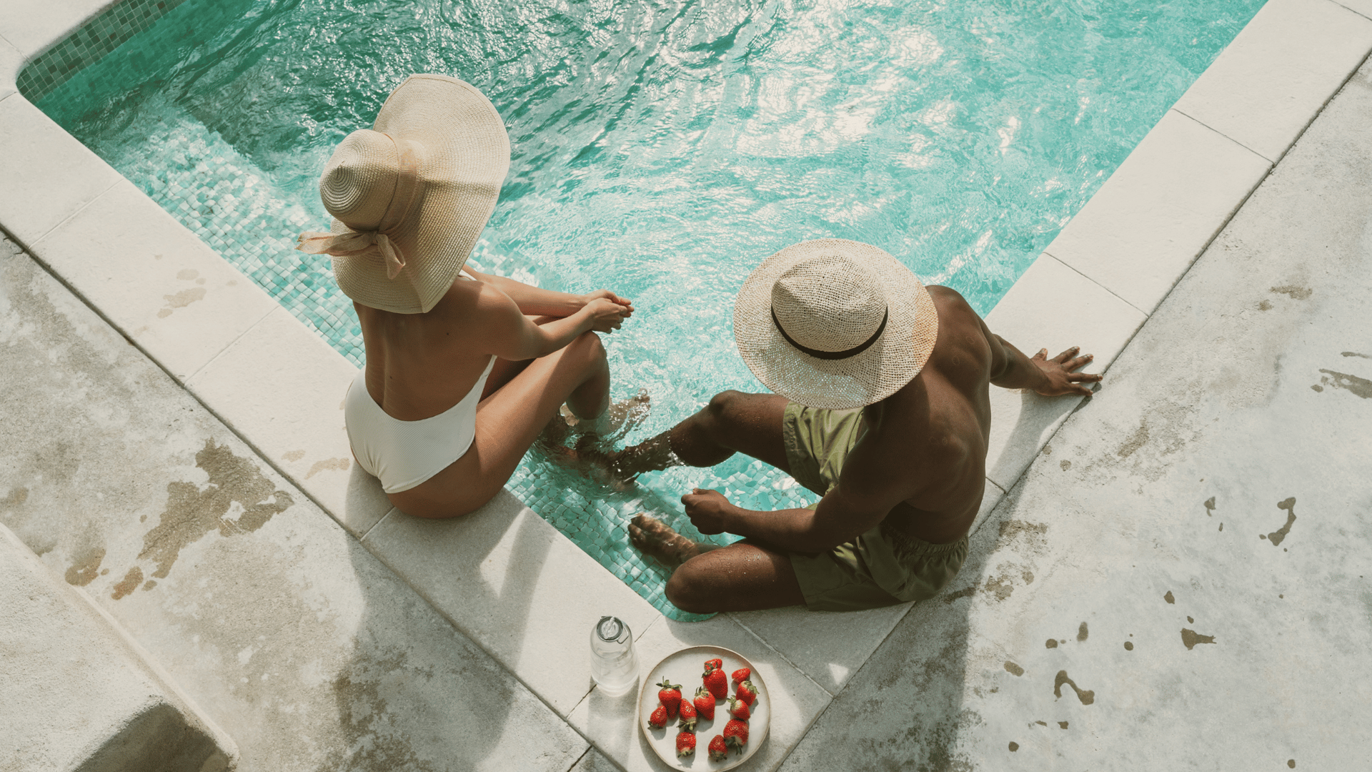 photo of brown bench near swimming pool
