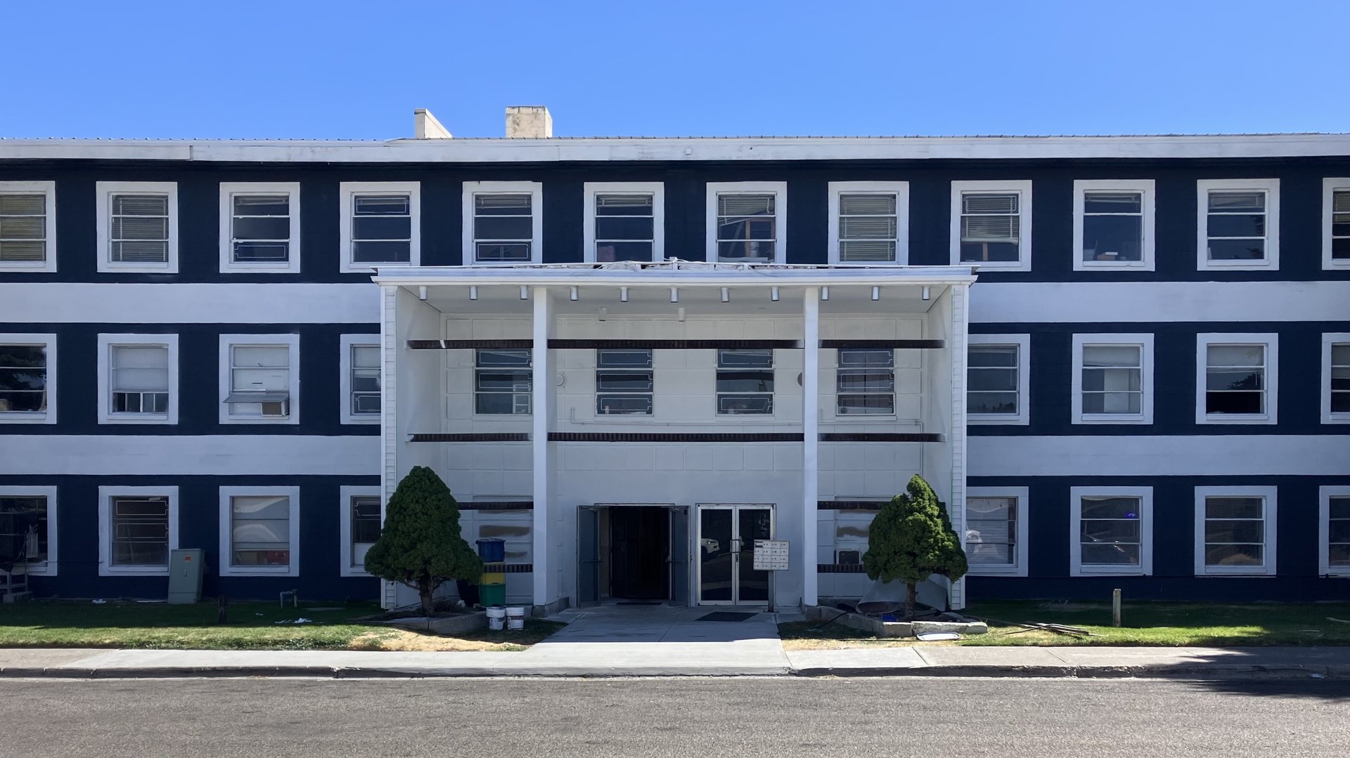 black and brown leather padded tub sofa