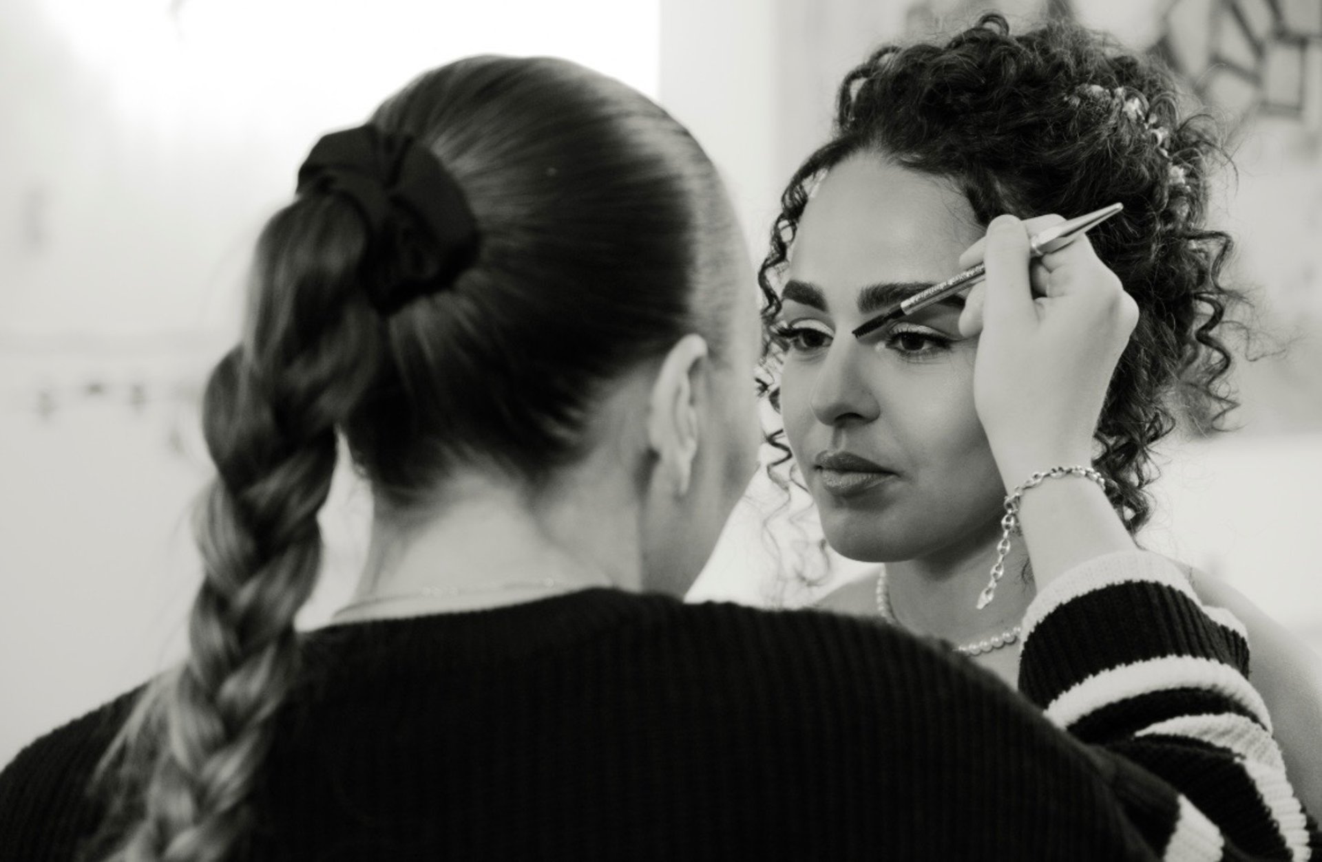 black and brown leather padded tub sofa