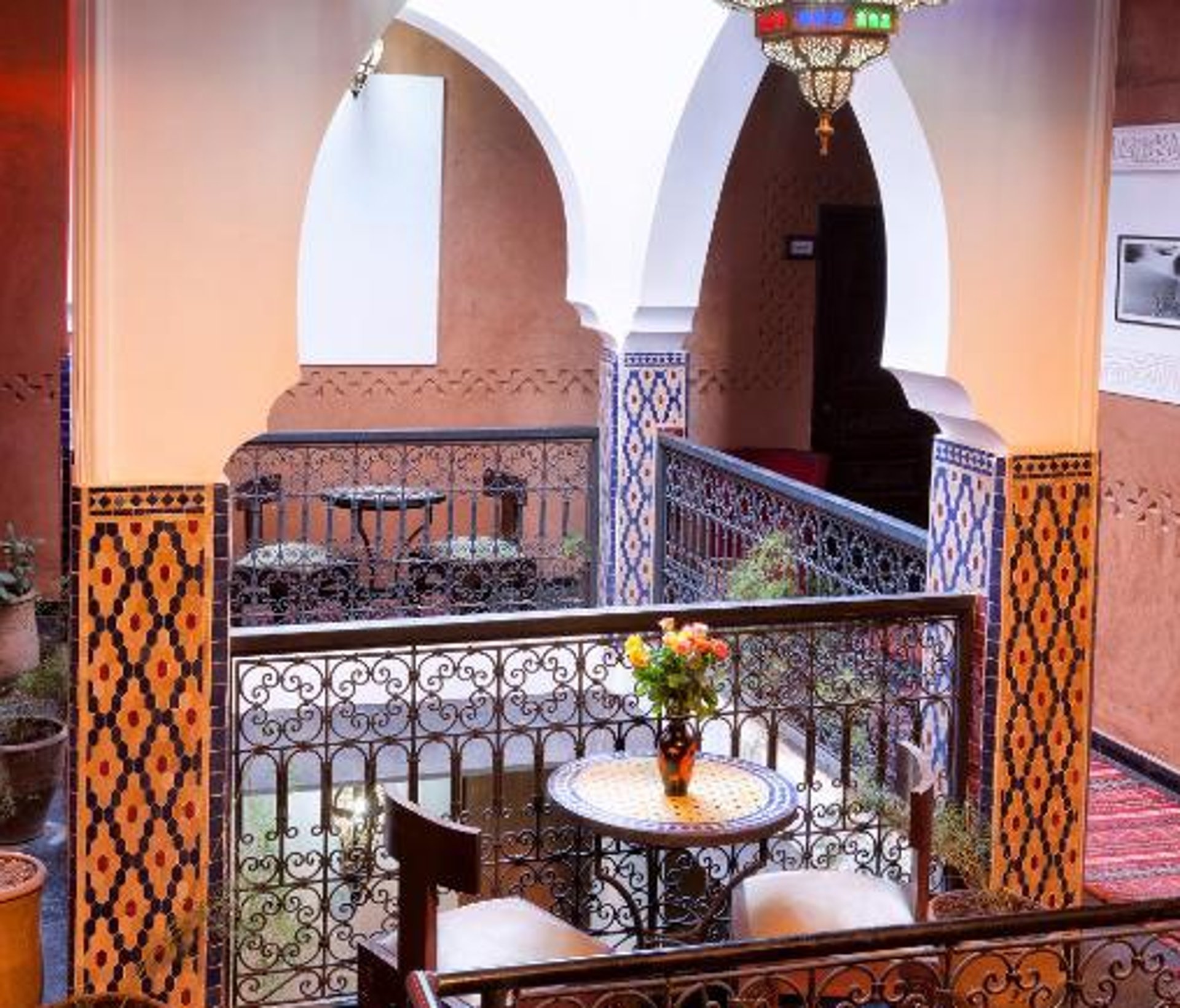 an abstract photo of a curved building with a blue sky in the background