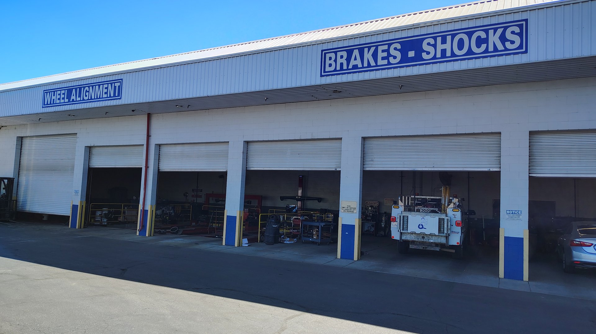 woman wearing yellow long-sleeved dress under white clouds and blue sky during daytime