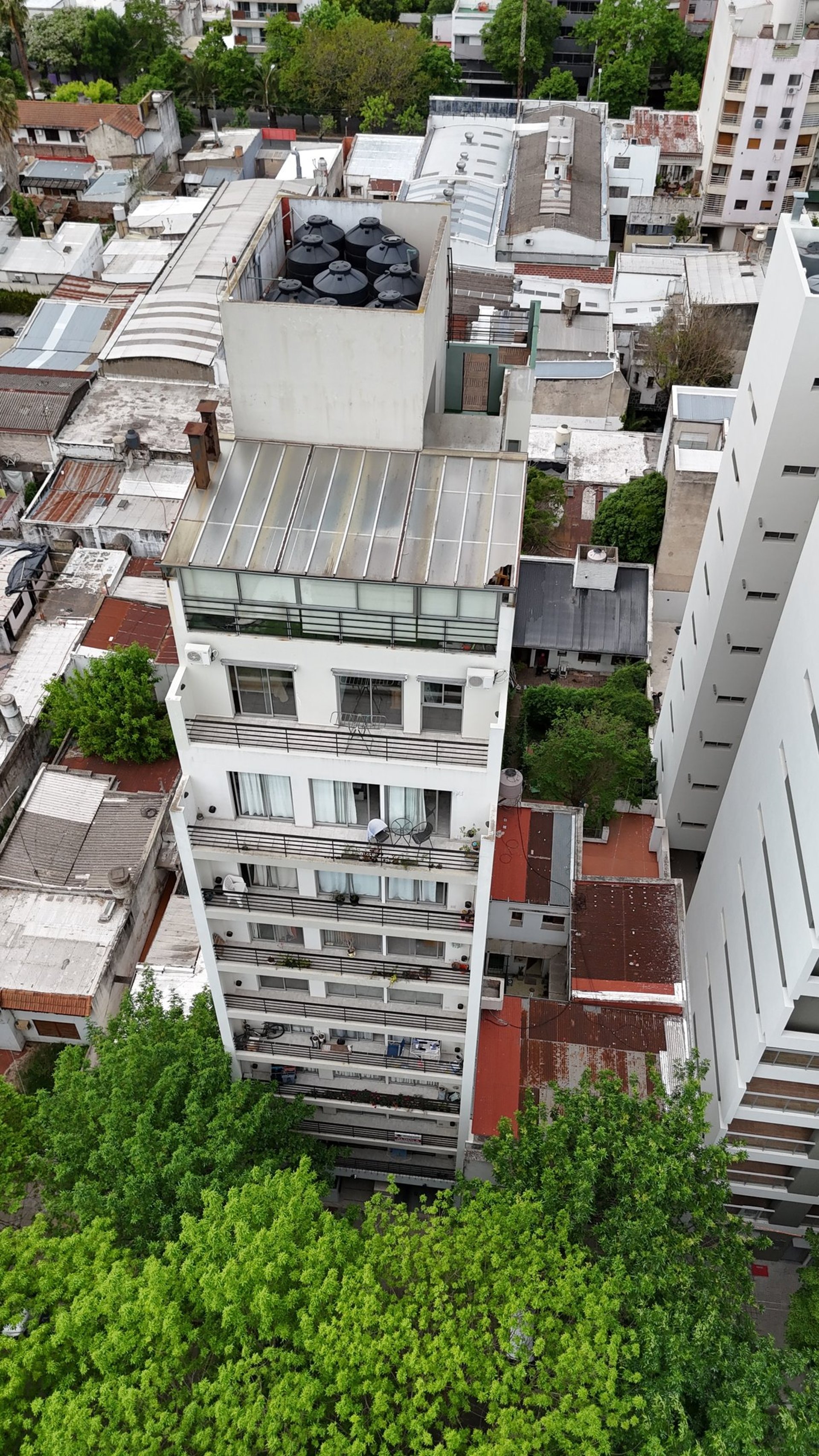 woman wearing yellow long-sleeved dress under white clouds and blue sky during daytime