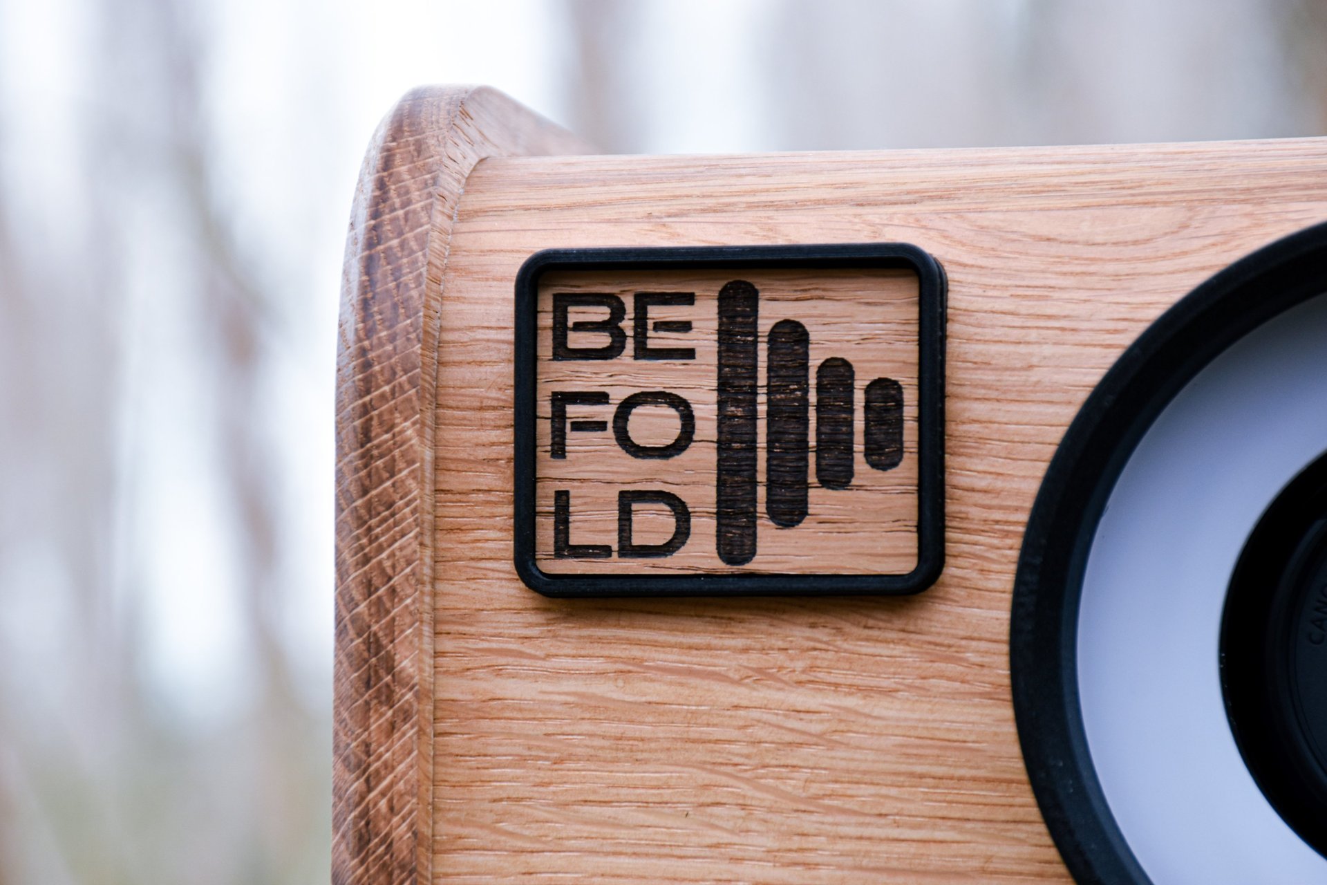 black camera lens on blue textile