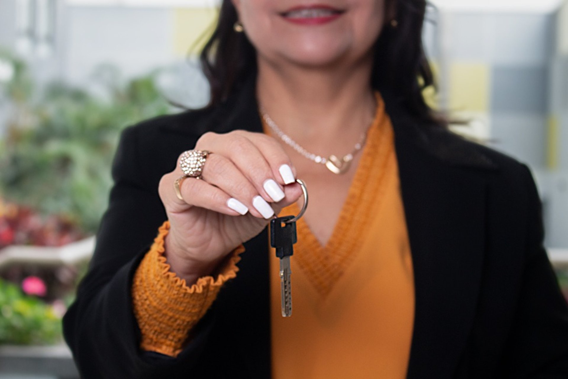 woman wearing yellow long-sleeved dress under white clouds and blue sky during daytime