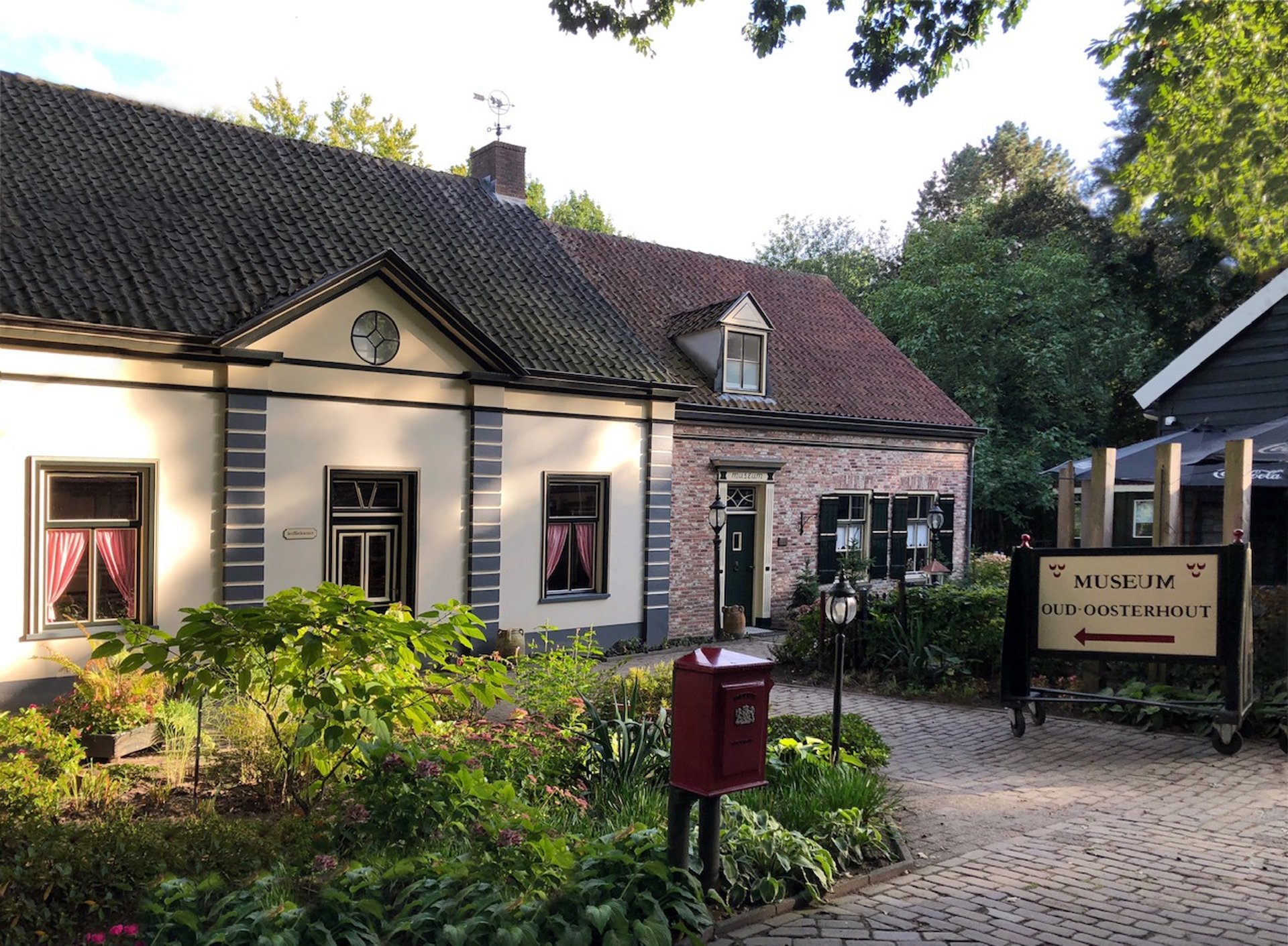 black and brown leather padded tub sofa