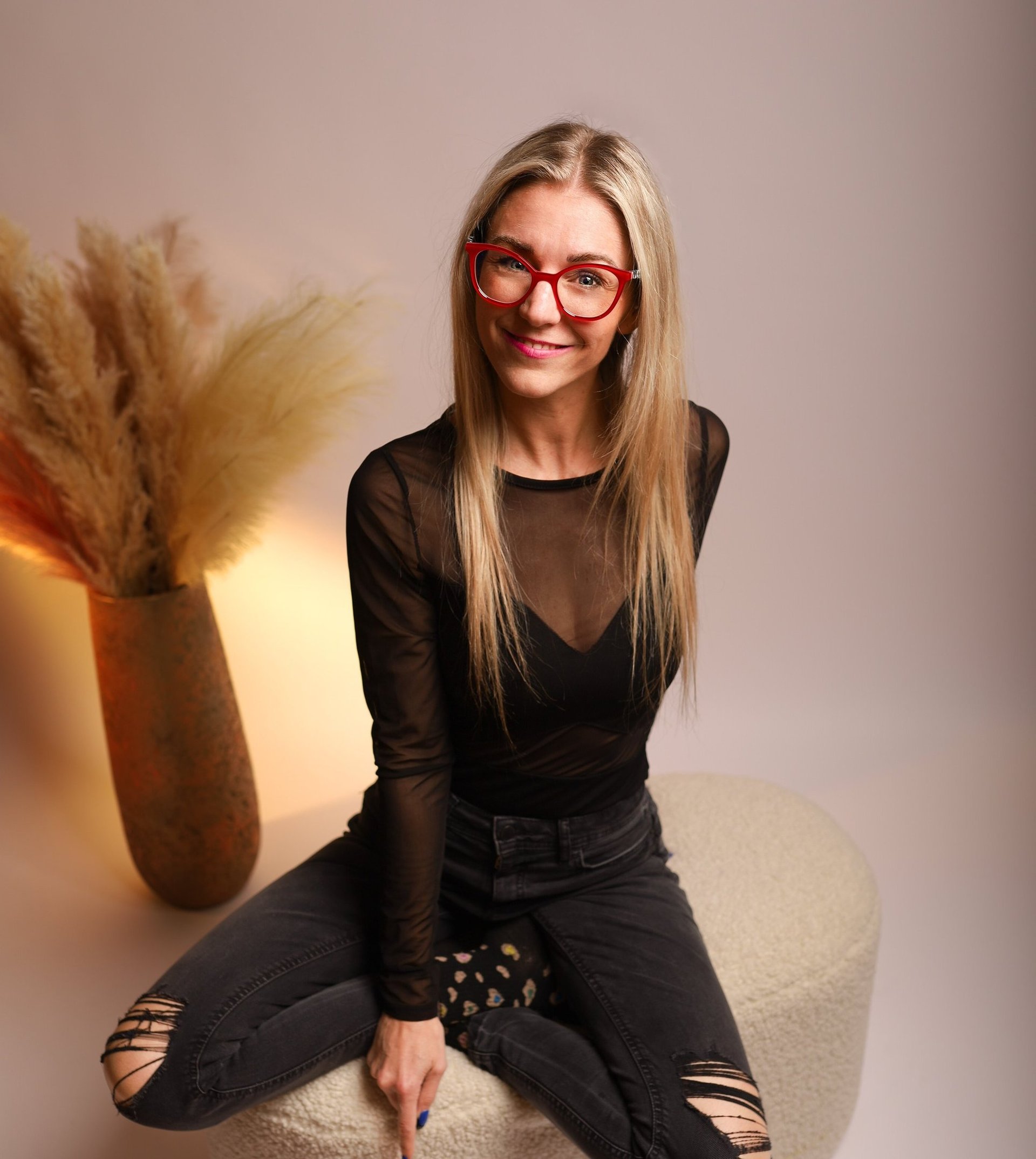 an abstract photo of a curved building with a blue sky in the background