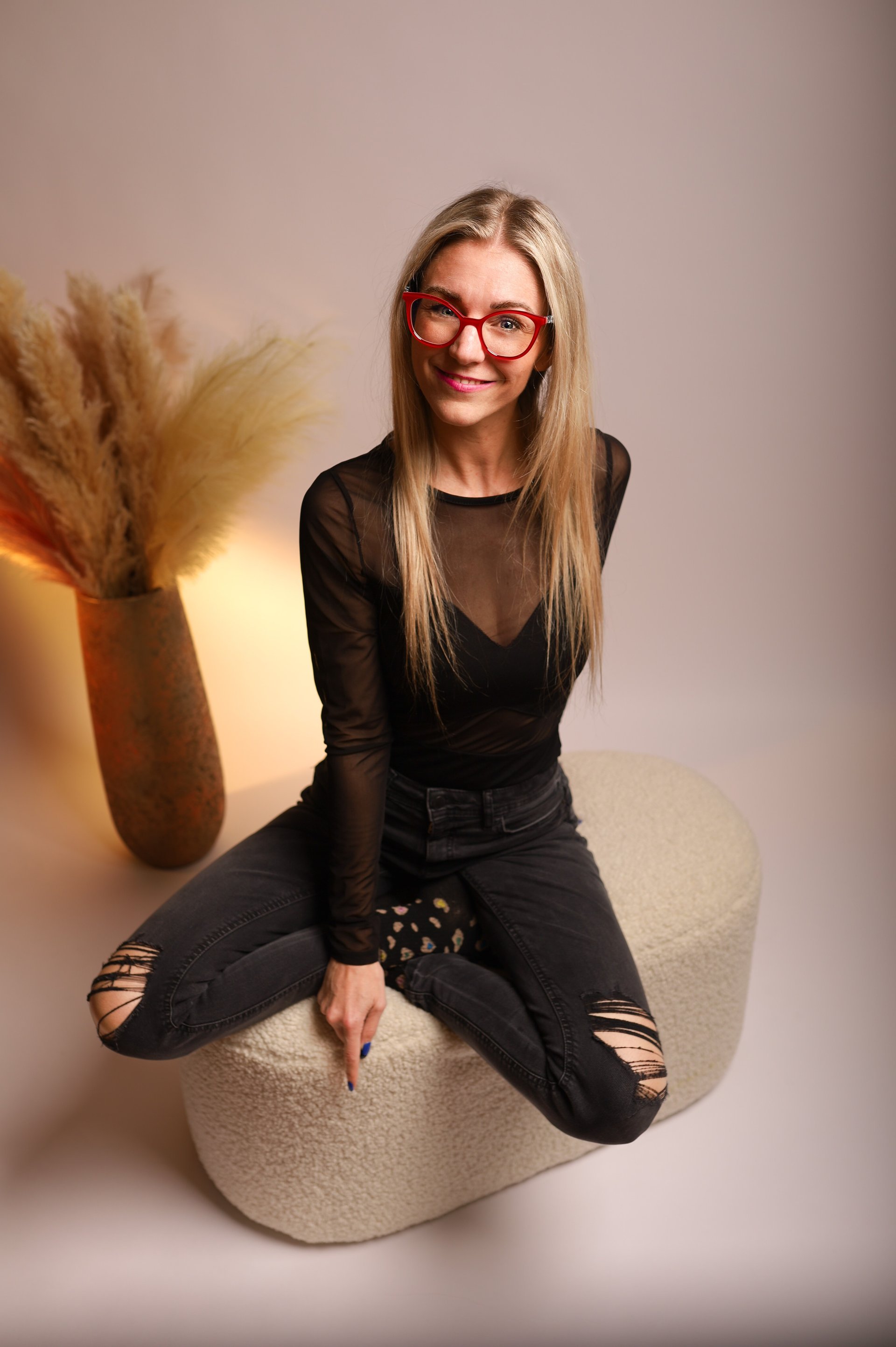 an abstract photo of a curved building with a blue sky in the background