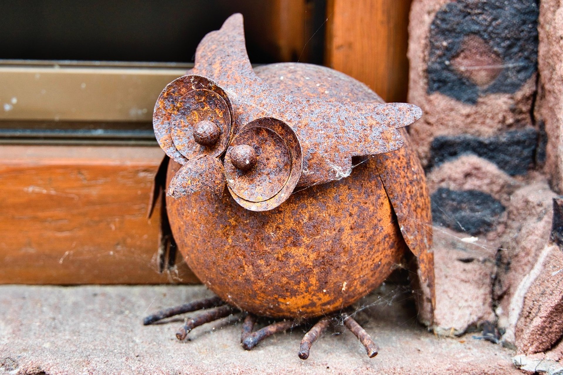 an abstract photo of a curved building with a blue sky in the background