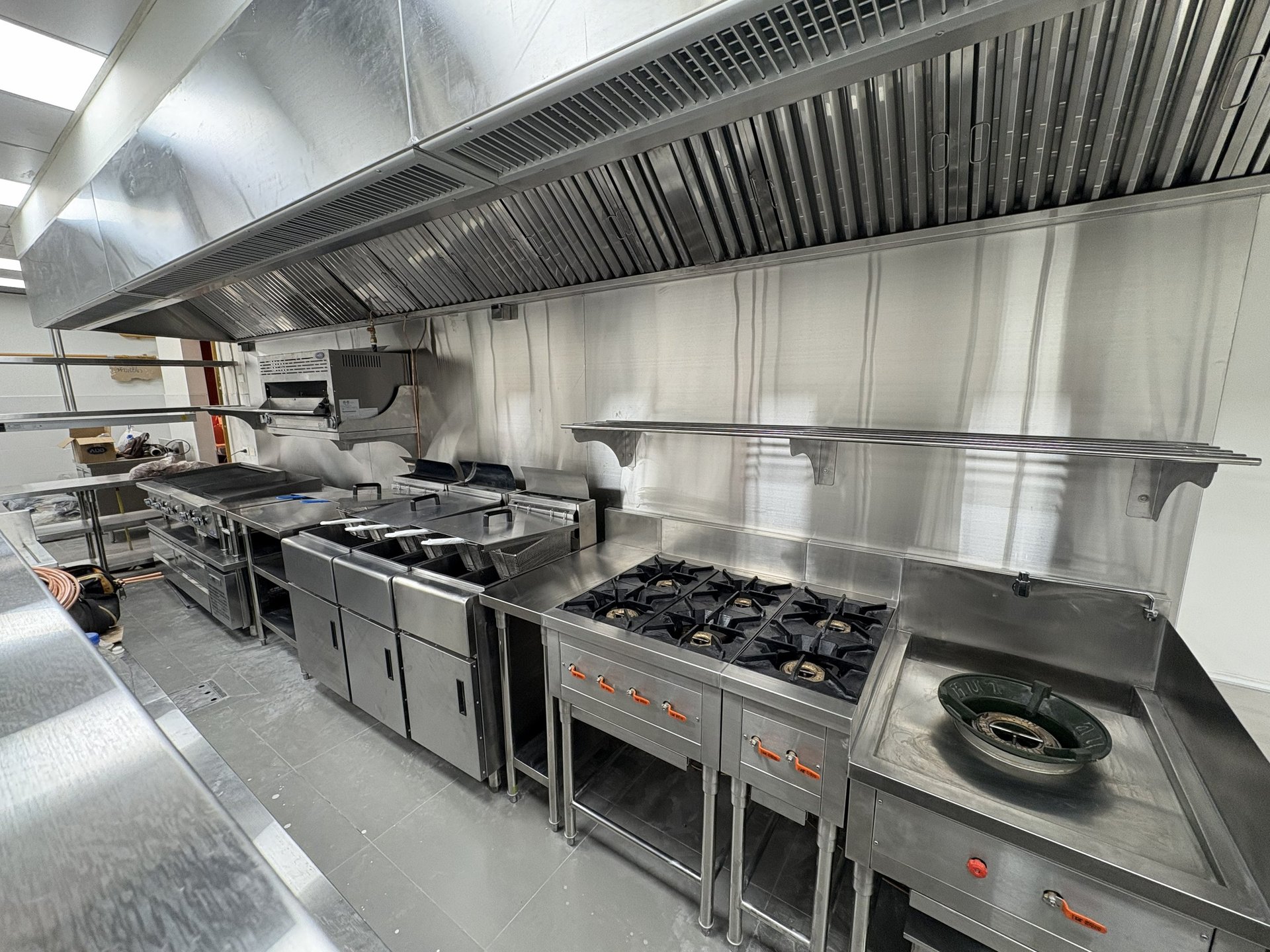 stainless steel cooking pots on stove