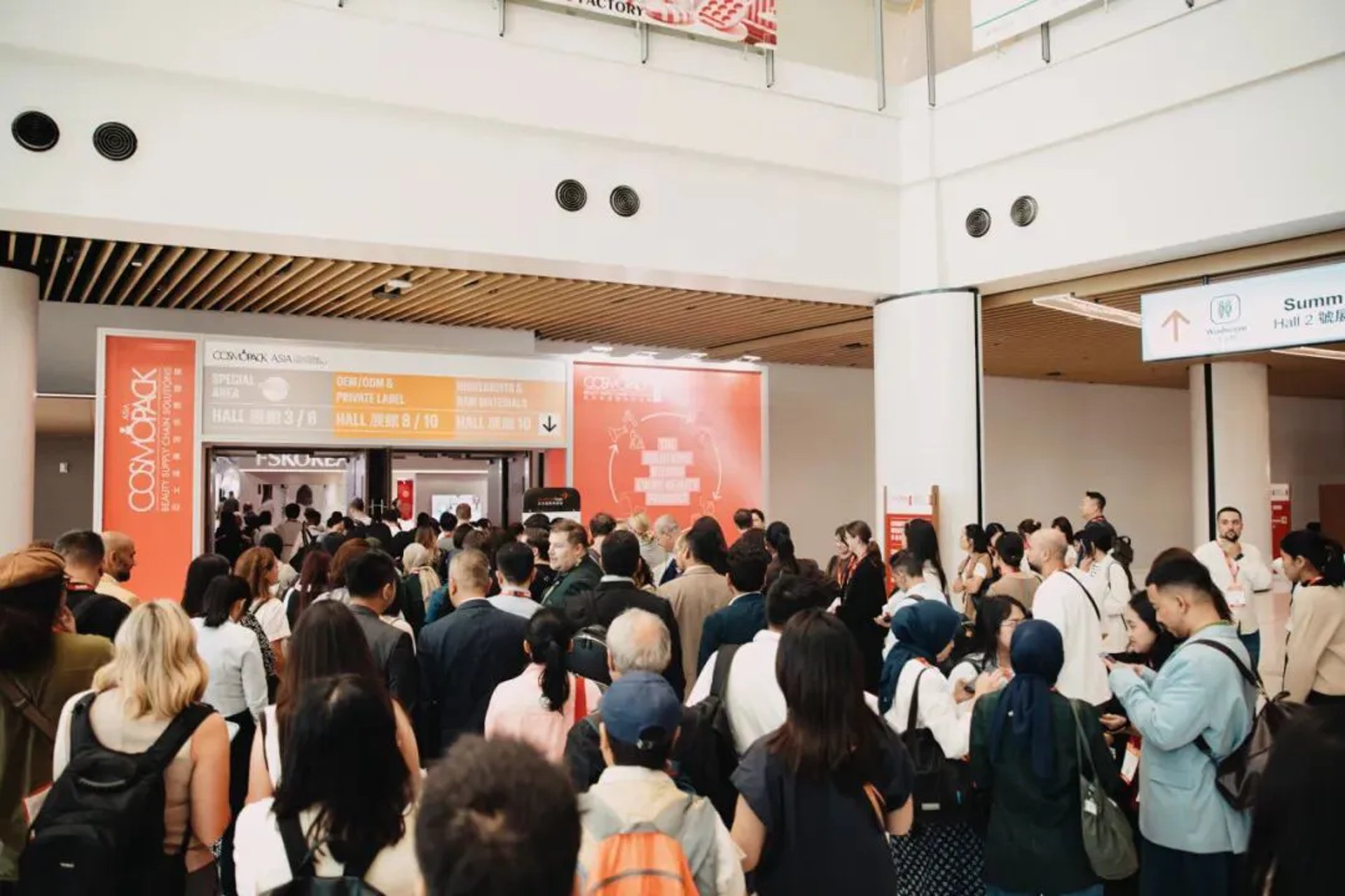 Beauty industry exhibitors and visitors at Cosmopack Asia 2025 in Hong Kong