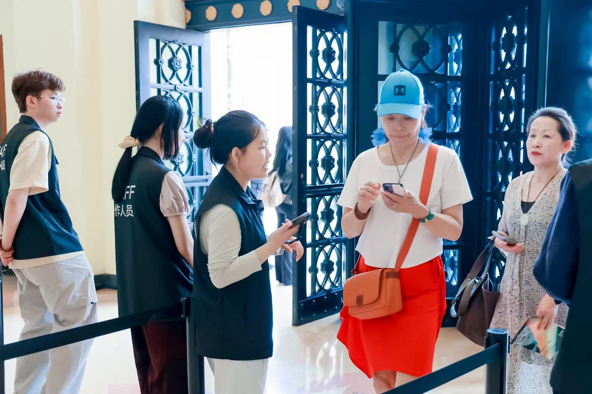 Self-service registration kiosk issuing a printed badge at JGA Hong Kong 2026