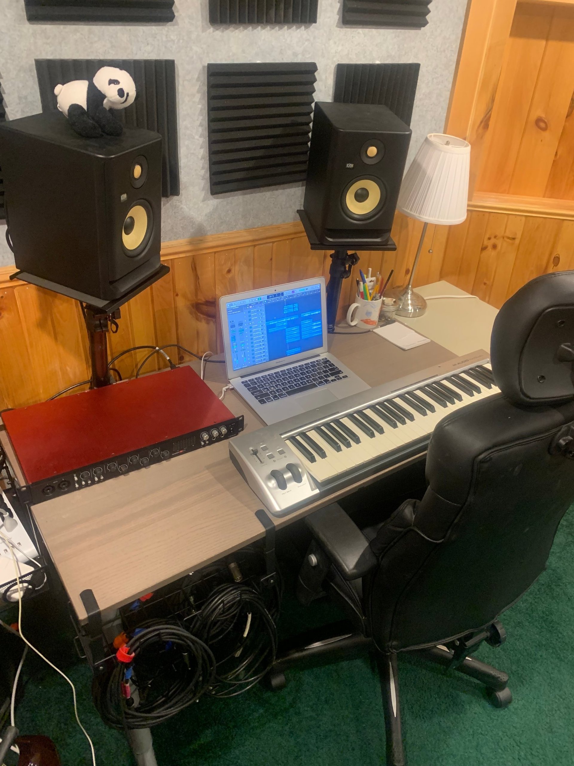 black flat screen computer monitor on brown wooden desk