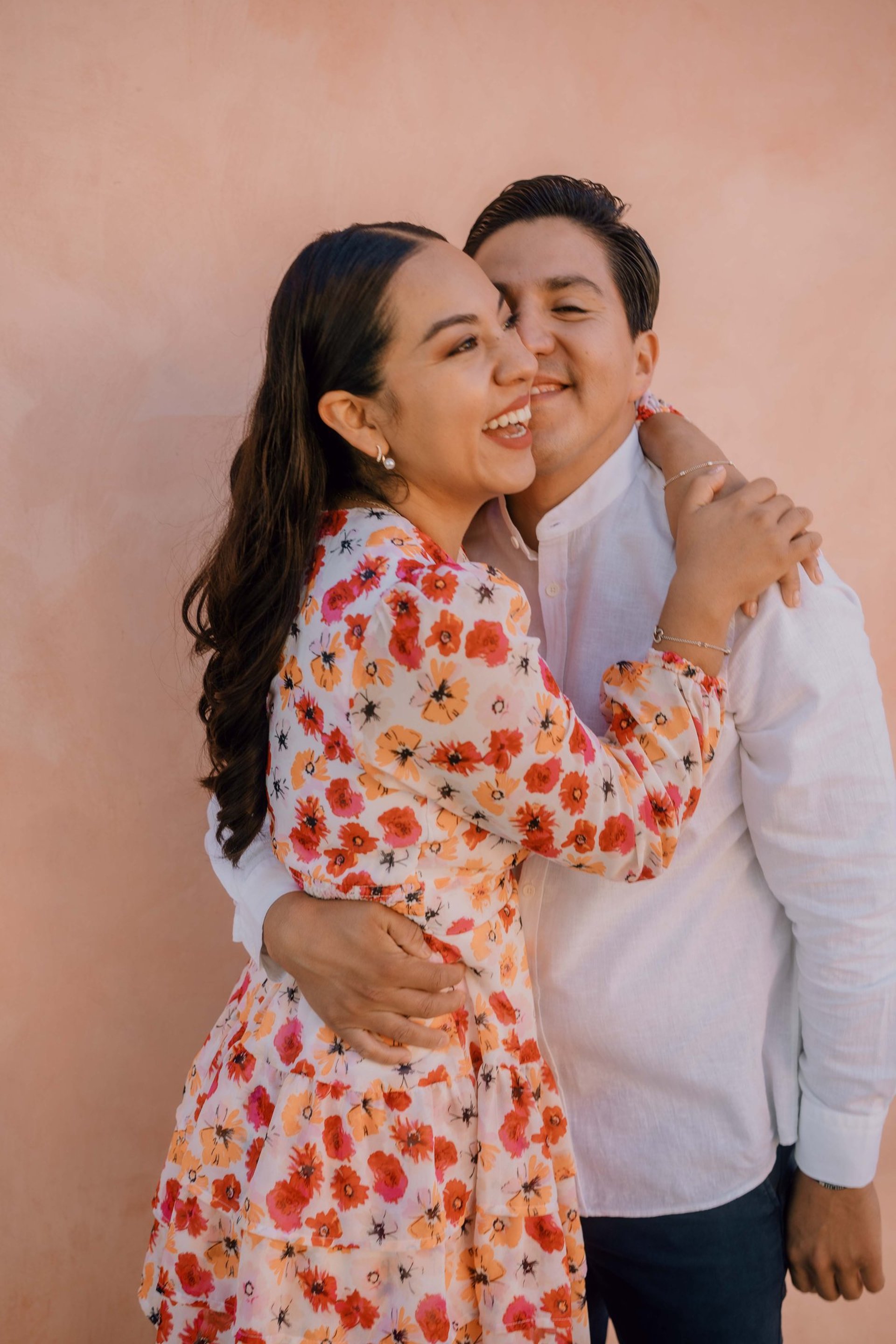 couple wearing silver-colored rings