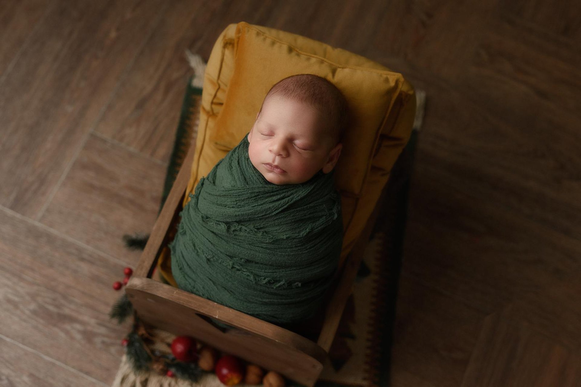 sleeping baby on white textile