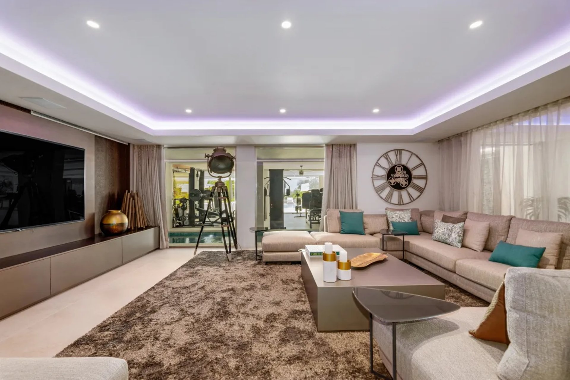 Spacious lounge with sofas and TV at Villa Serenity Marbella