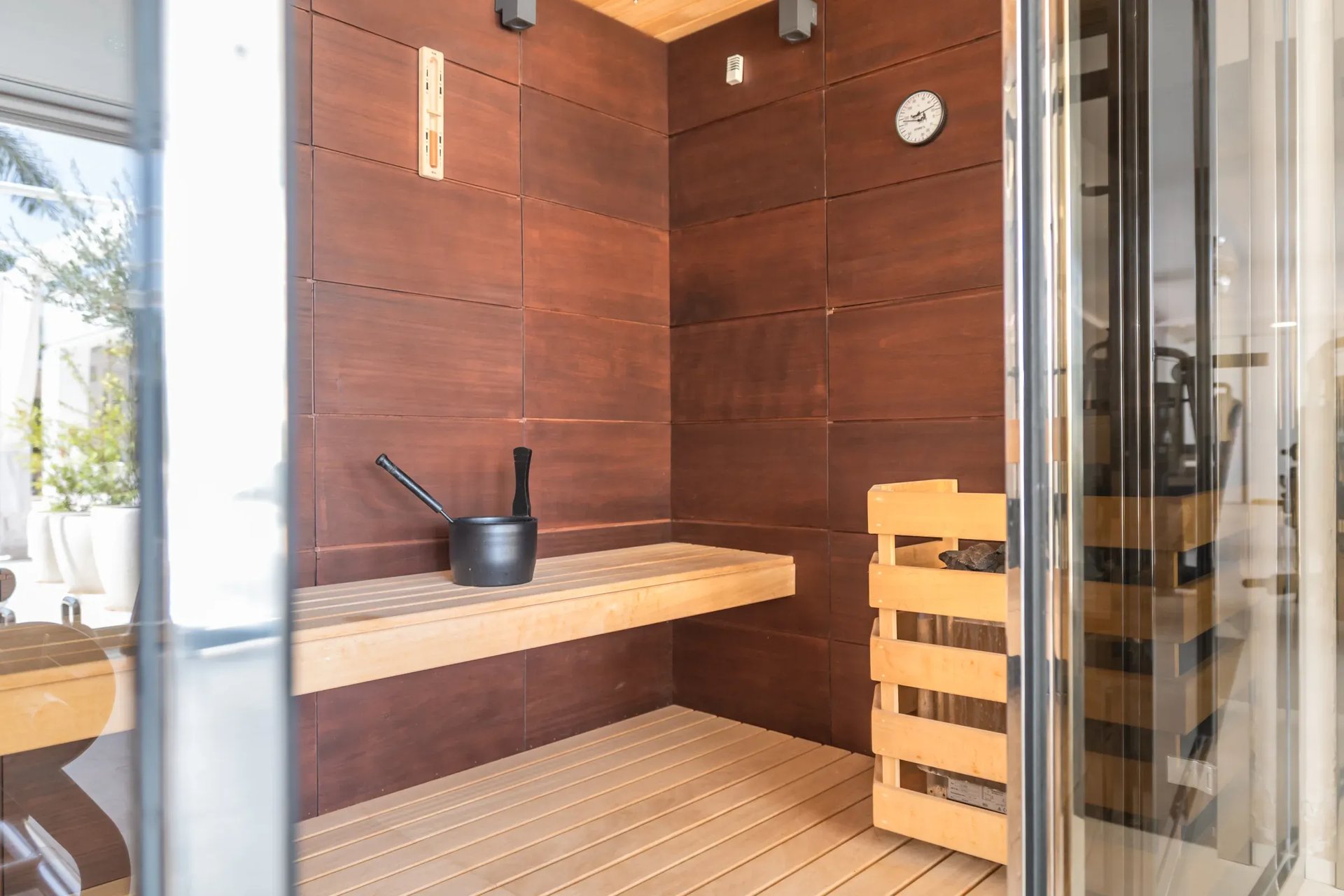 Luxury villa sauna at Villa Serenity with warm wood interior