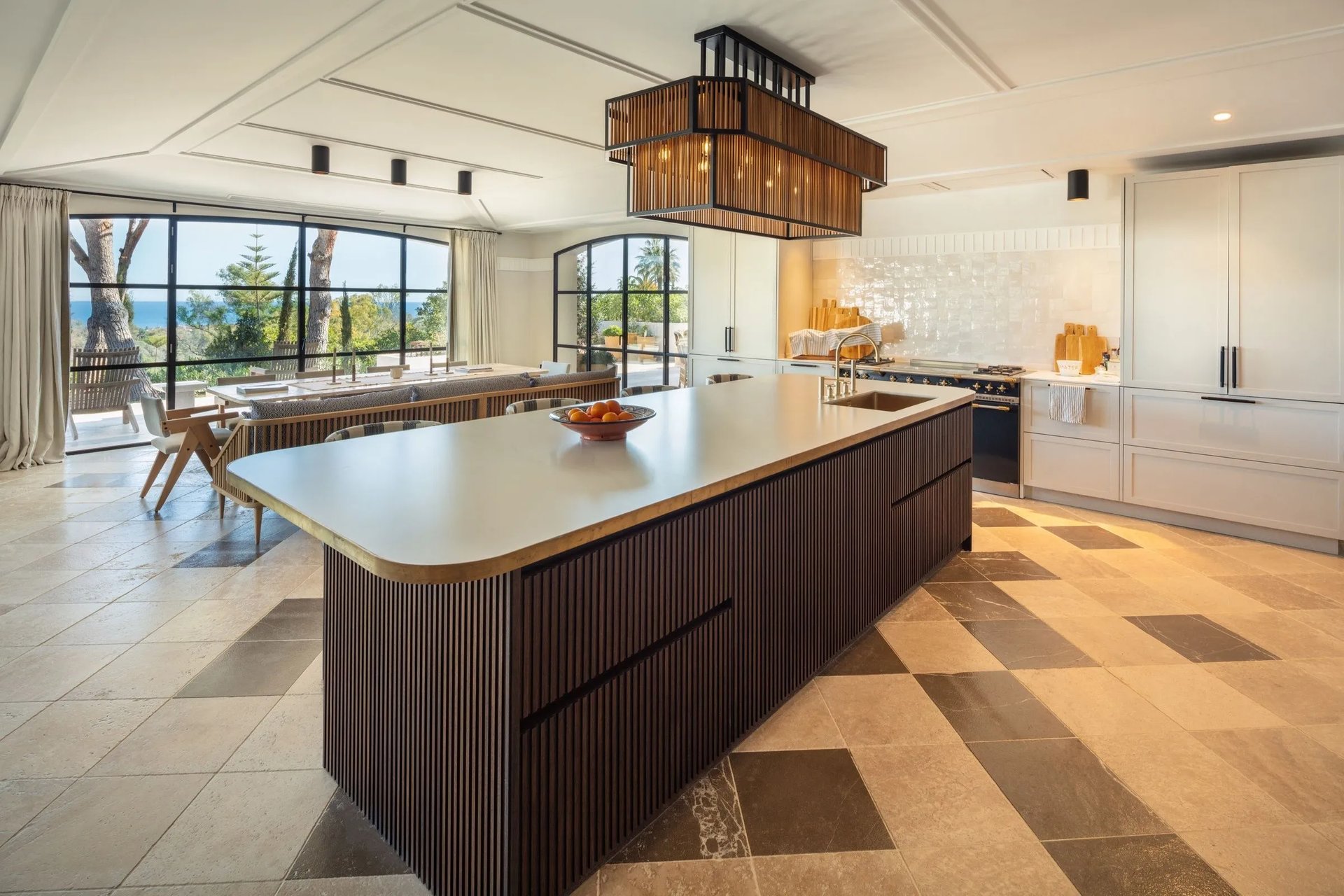 Kitchen at Villa La Gratitud with central island and sea views