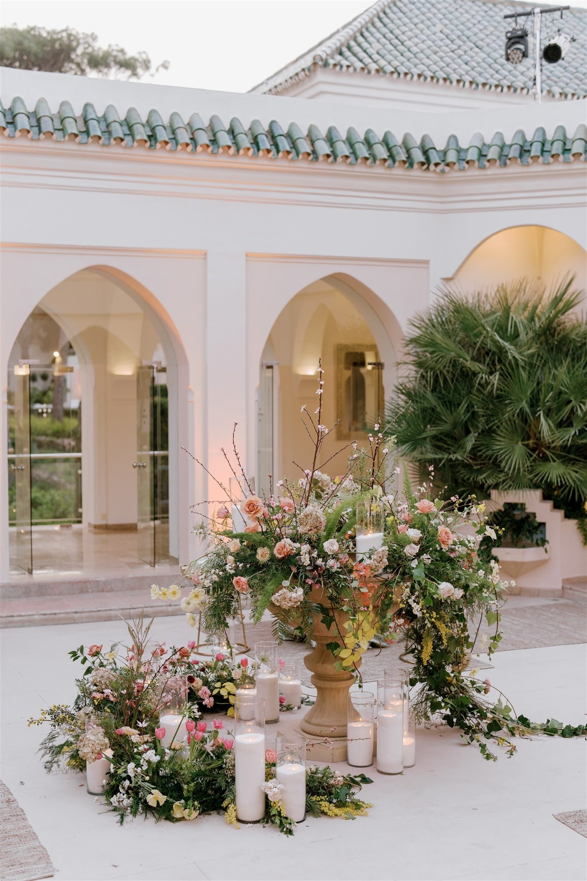 Outdoor dining area at Villa El Rincon in Marbella, with beautiful decorations for a Mediterranean destination wedding.