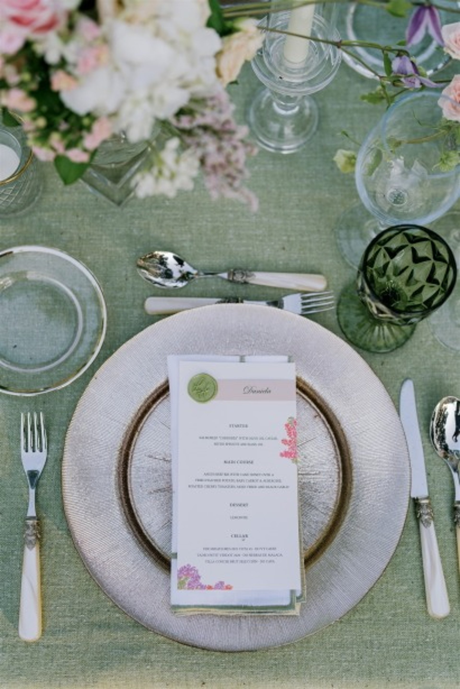 Elegant wedding table setting at Villa El Rincon with menu and floral details
