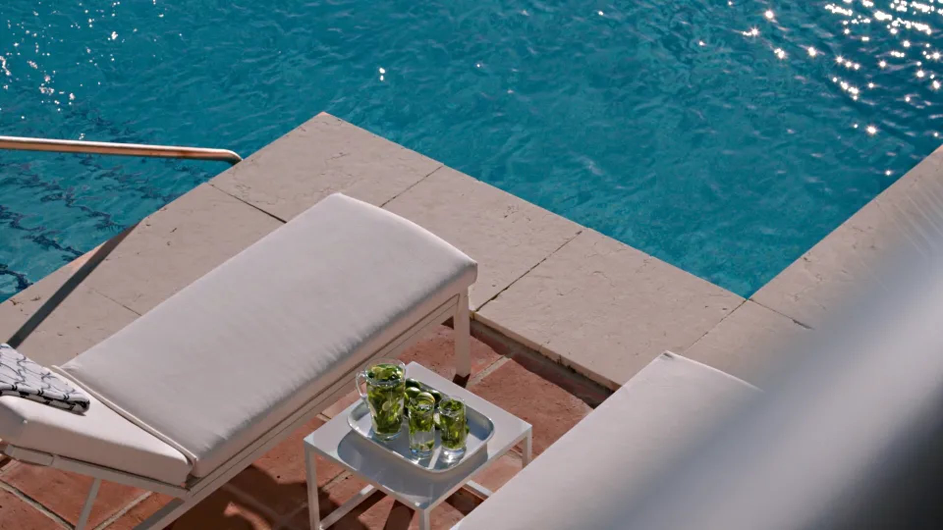 Chic poolside detail at Villa El Rincon with tray service