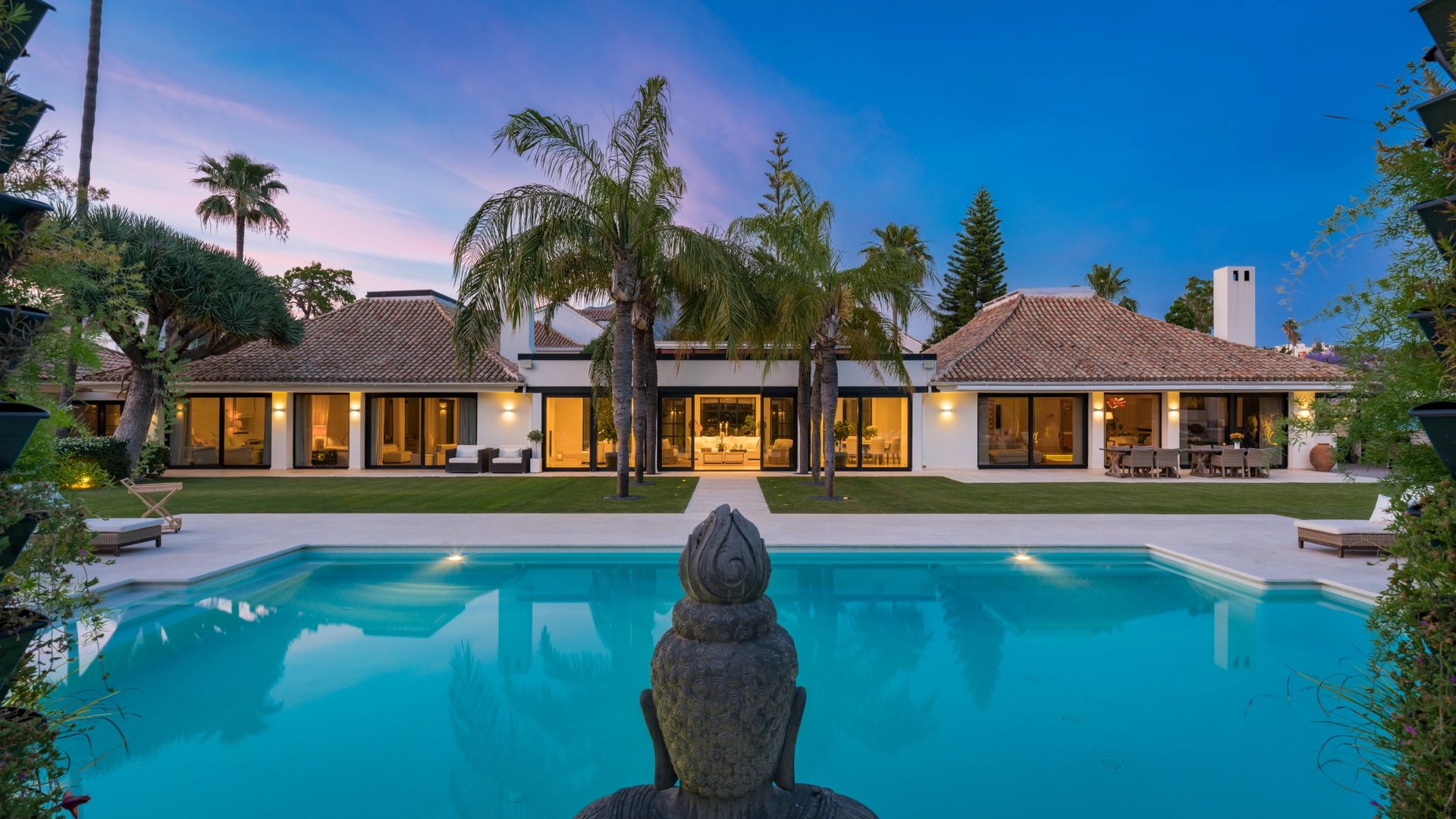 Terrace lounge at Villa La Gratitud with sea views and shaded pergola