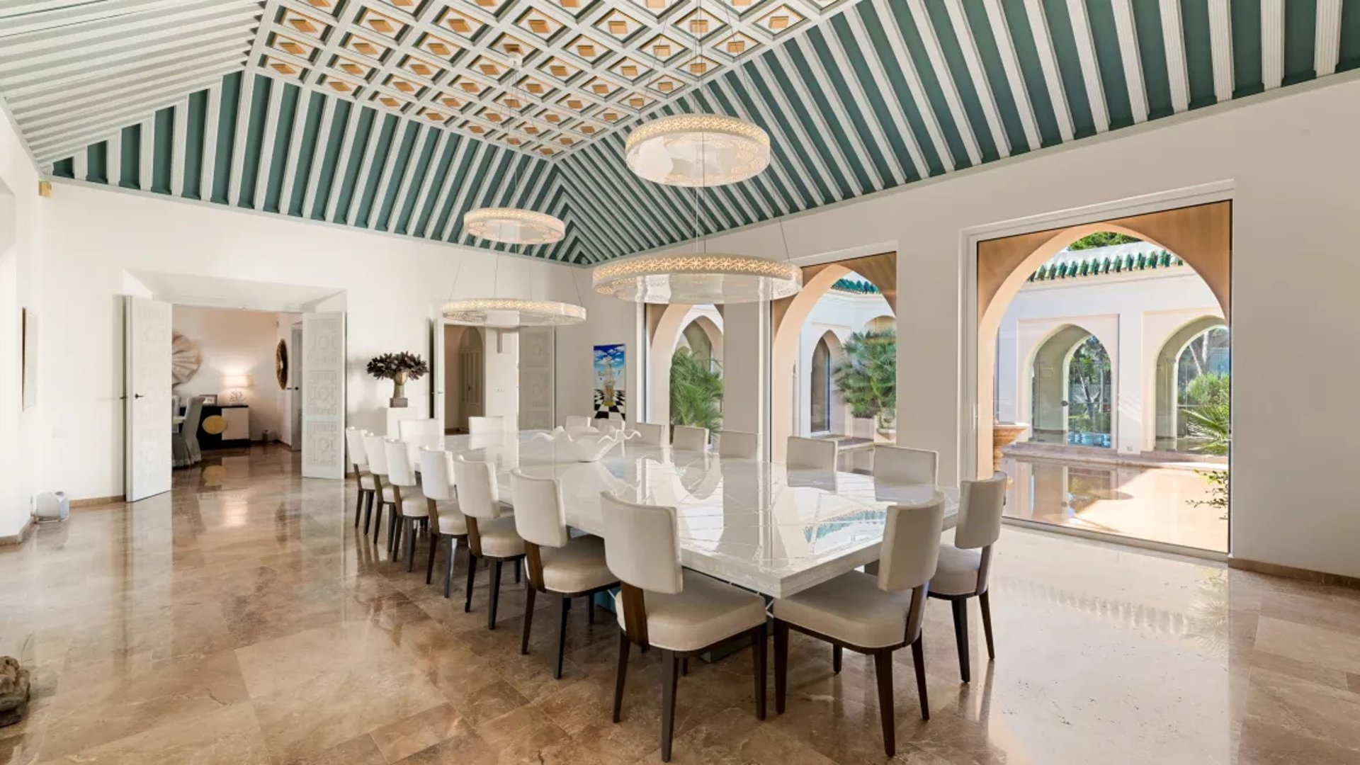 Formal dining hall at Villa El Rincon with high ceiling