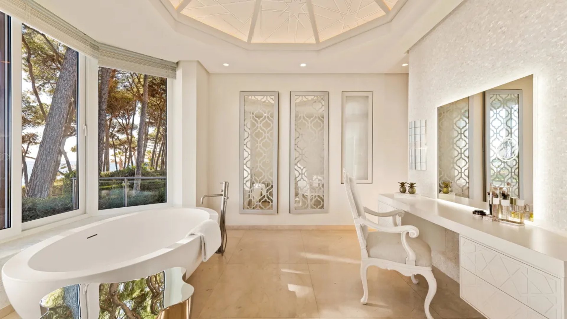 Bathroom at Villa El Rincon with freestanding tub and garden views