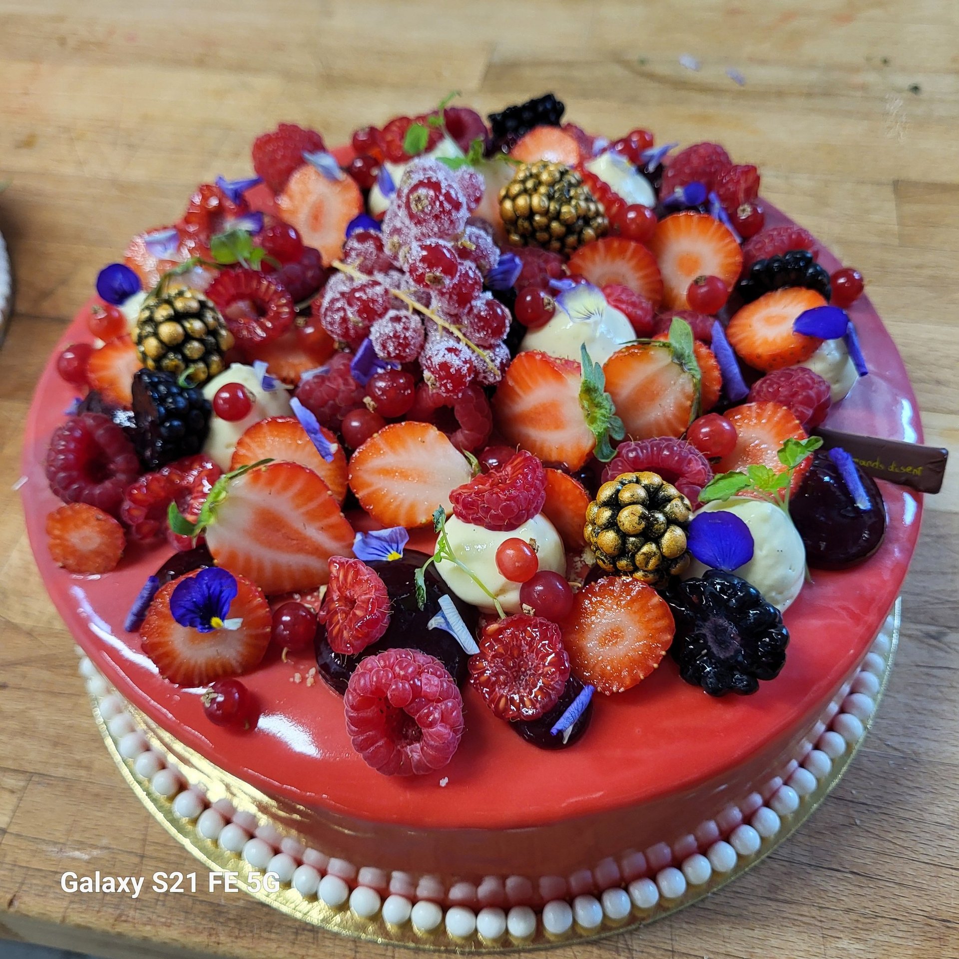 an abstract photo of a curved building with a blue sky in the background
