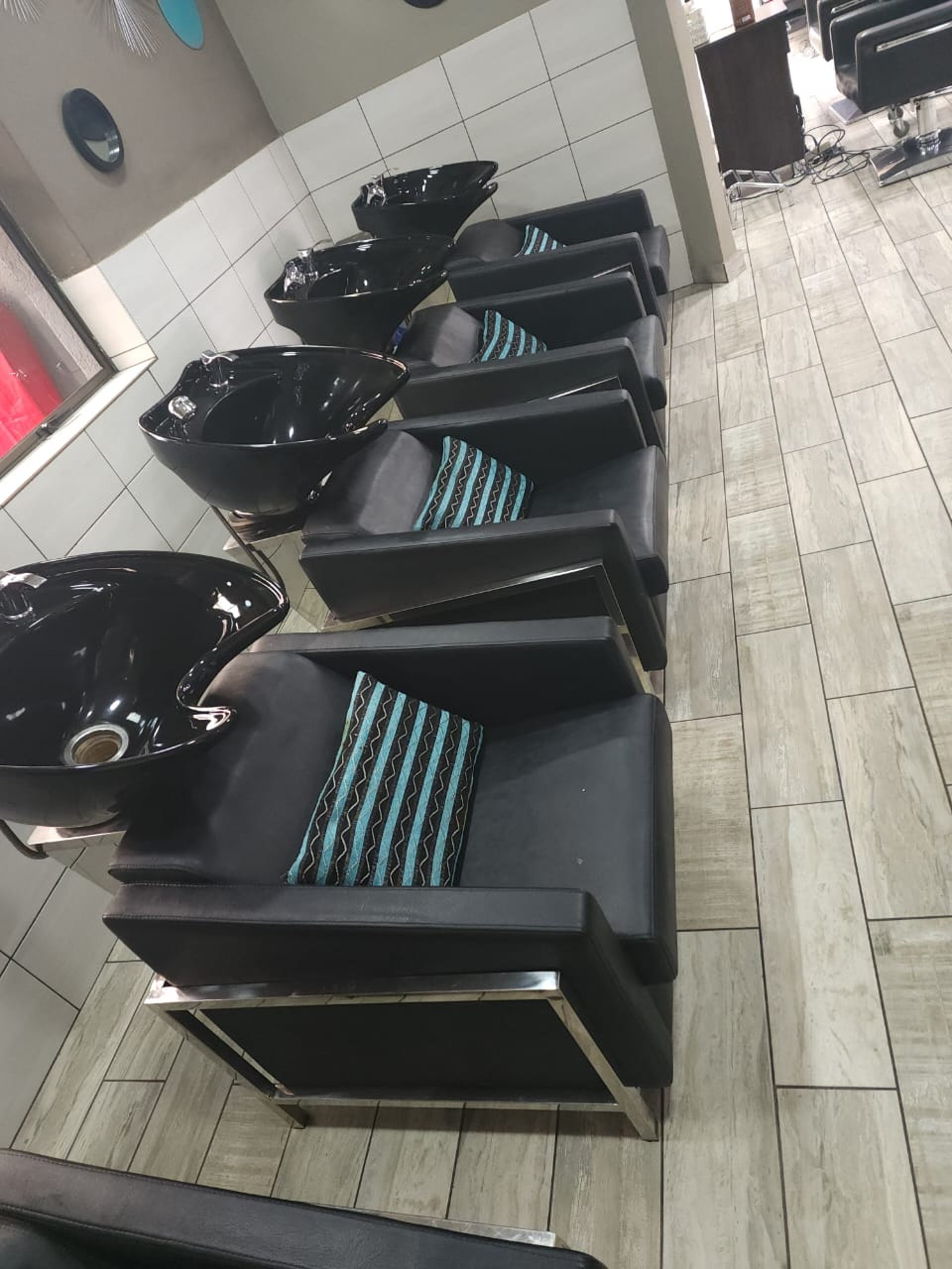 black sunglasses on black leather chair