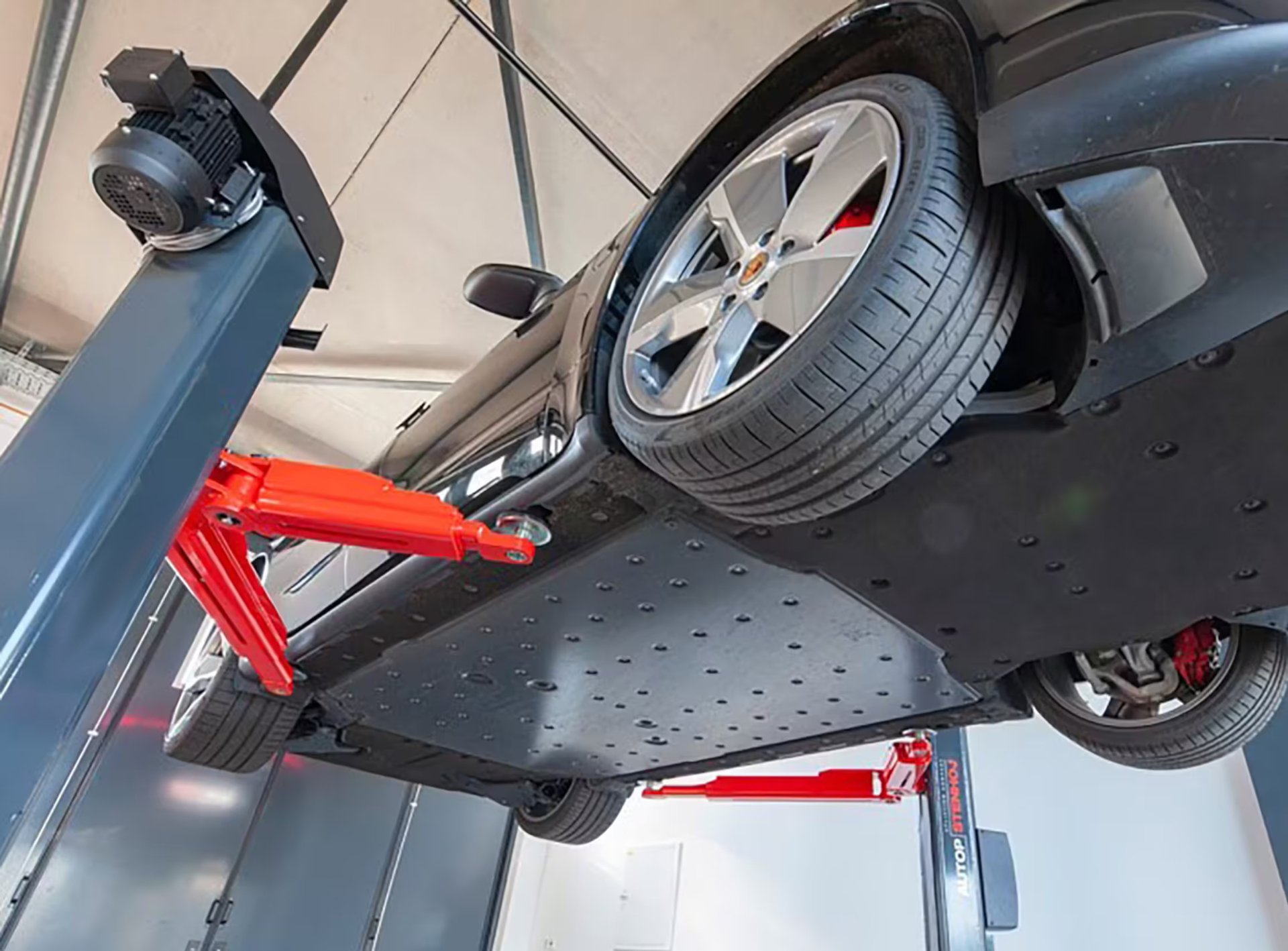 black and brown leather padded tub sofa