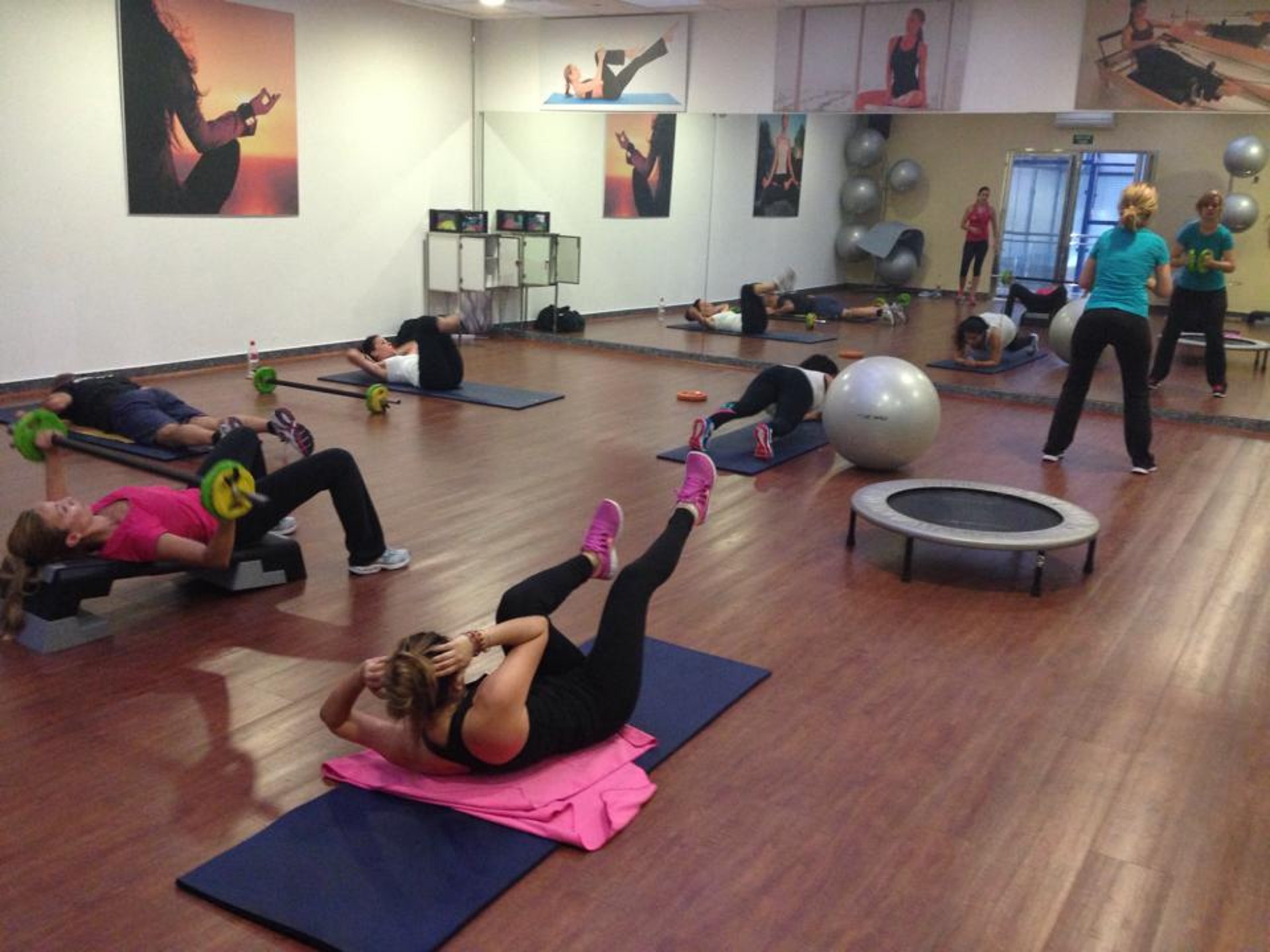an abstract photo of a curved building with a blue sky in the background