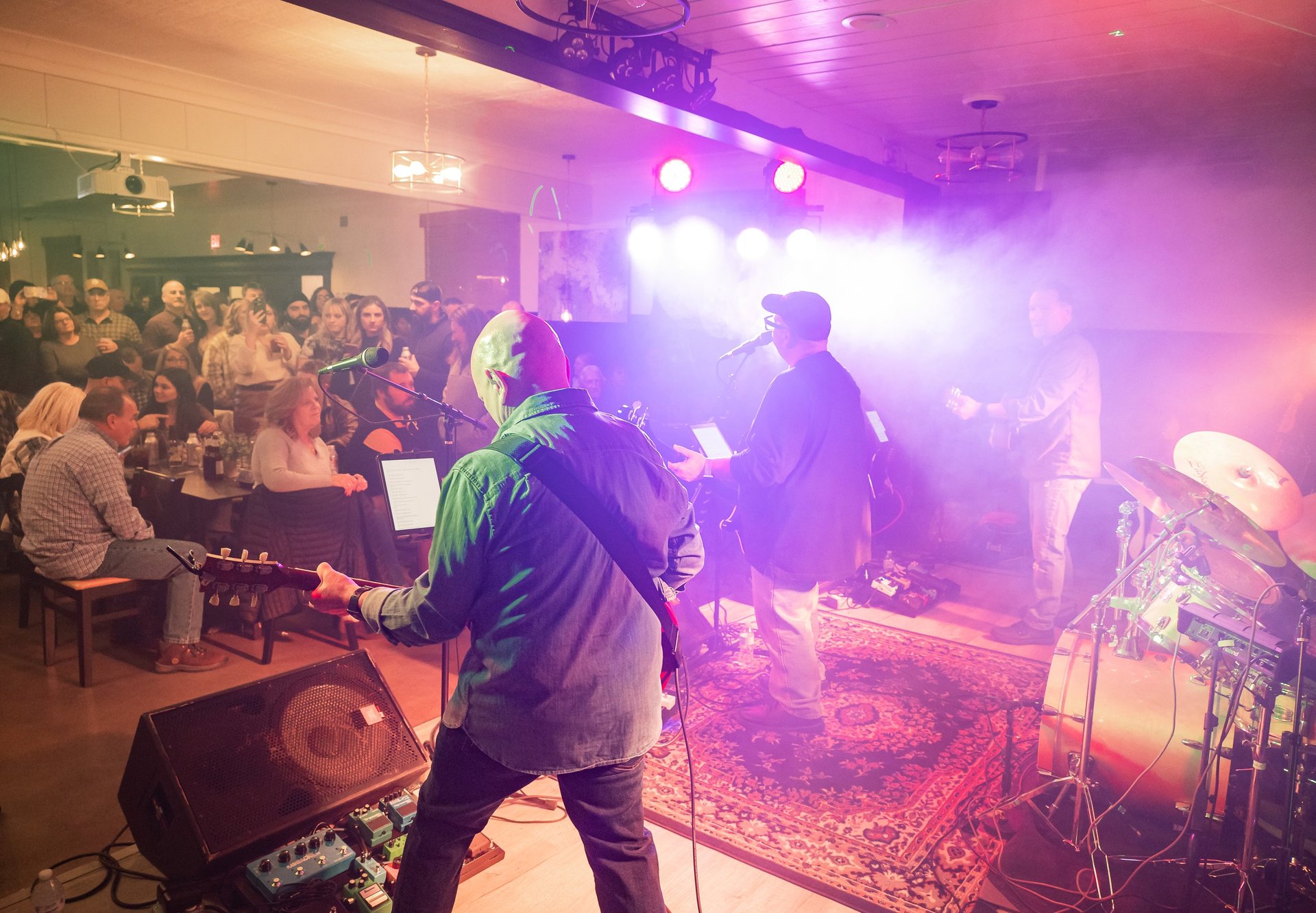 an abstract photo of a curved building with a blue sky in the background