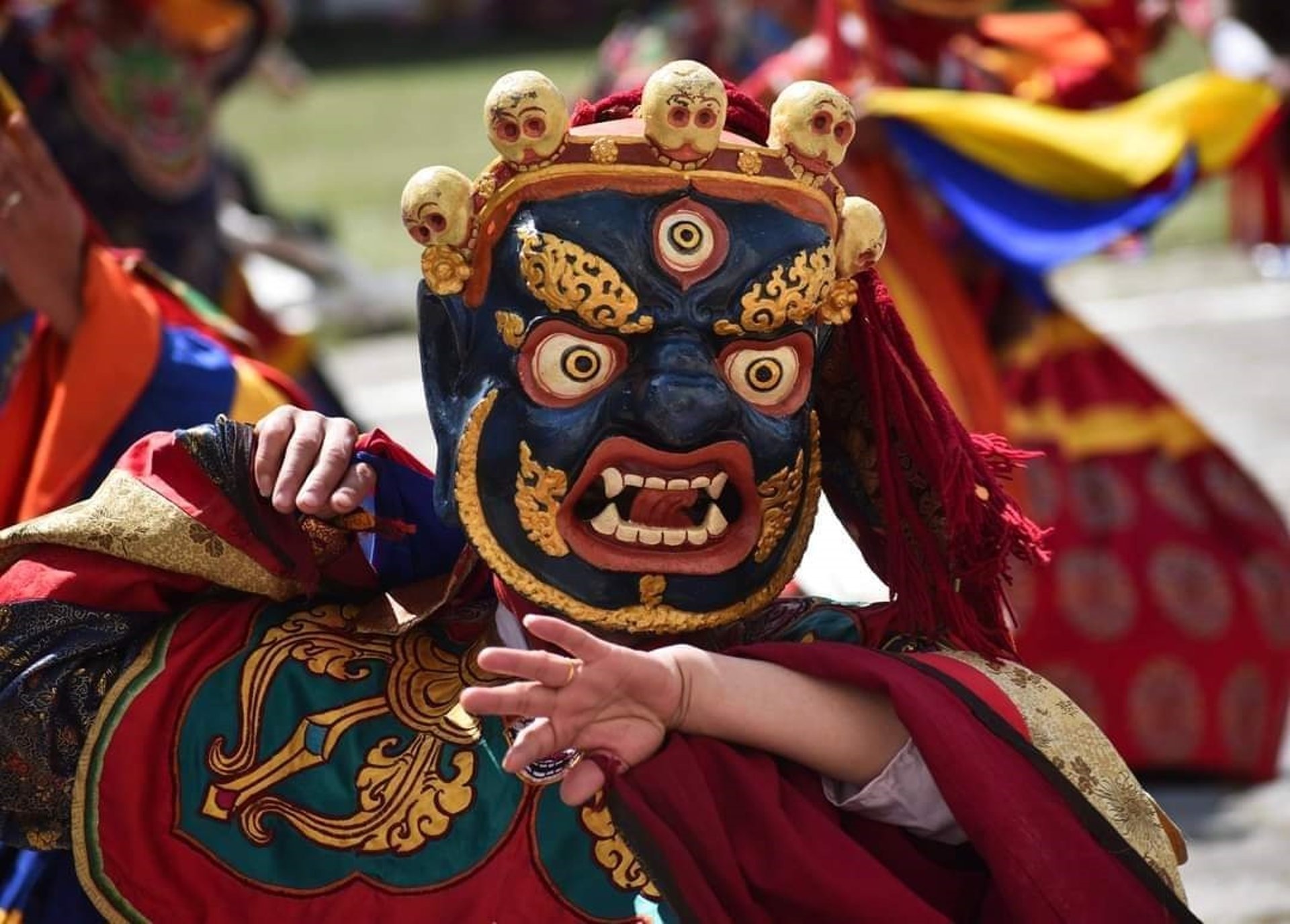 an abstract photo of a curved building with a blue sky in the background