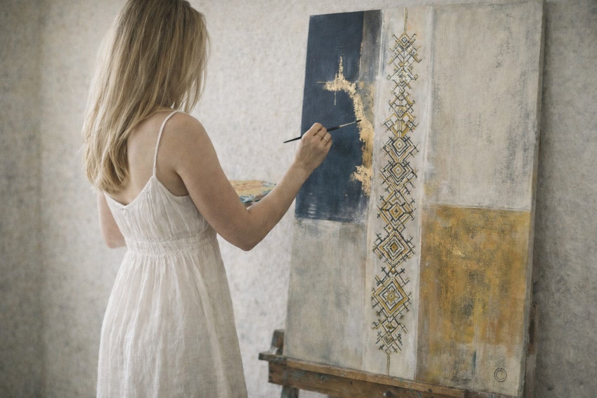 an abstract photo of a curved building with a blue sky in the background