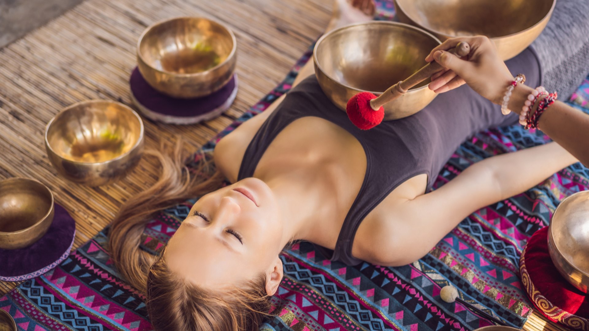 woman wearing yellow long-sleeved dress under white clouds and blue sky during daytime