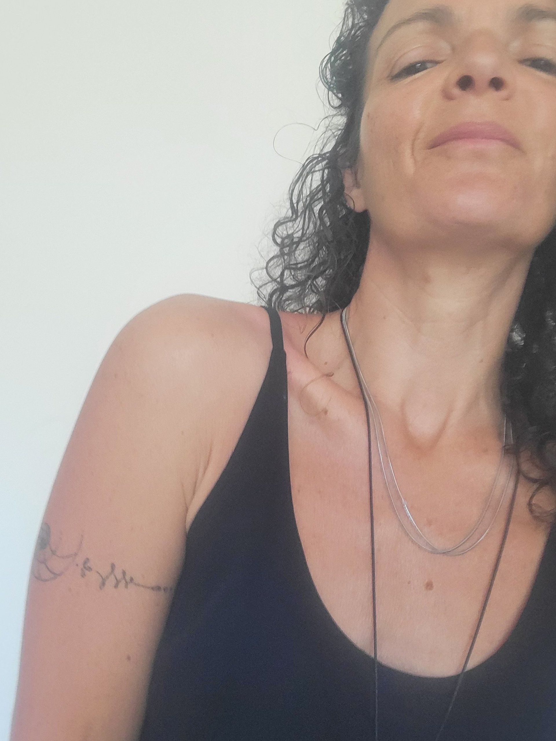 black and brown leather padded tub sofa