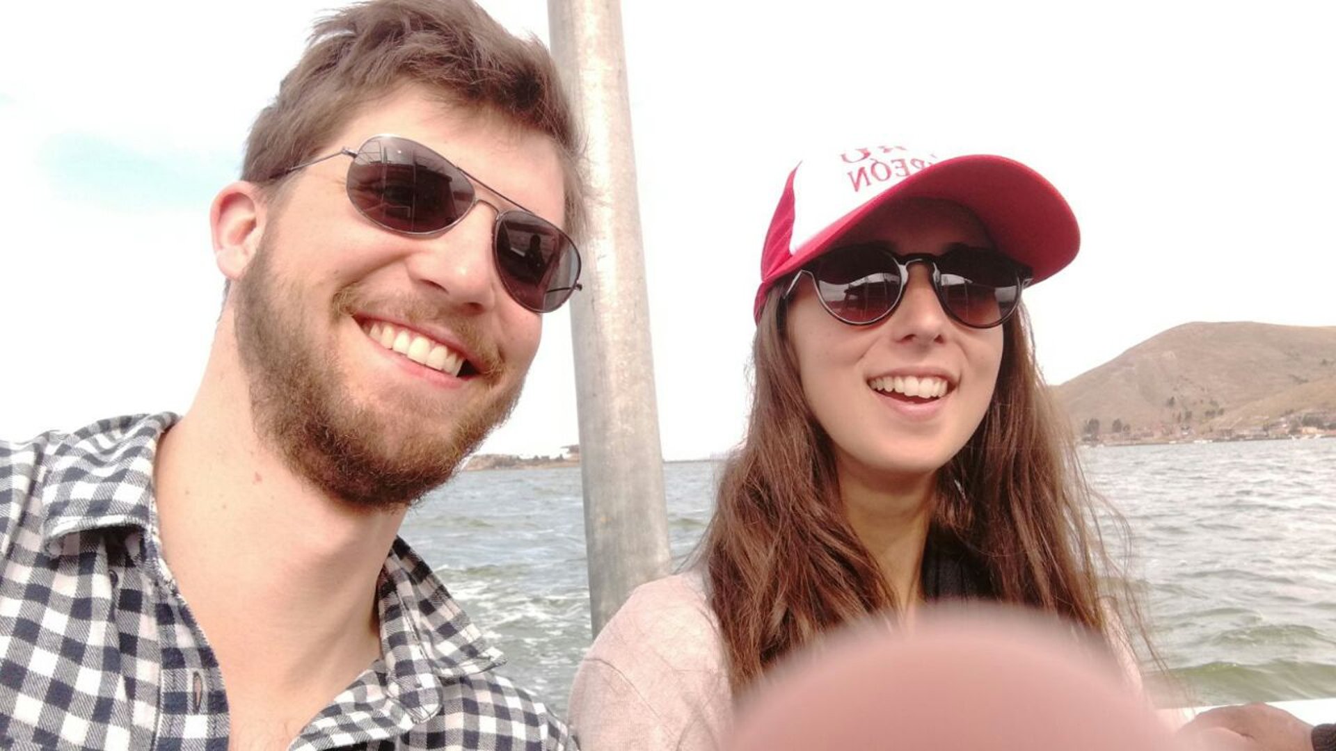 couple wearing silver-colored rings