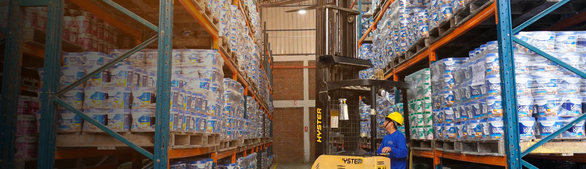 an abstract photo of a curved building with a blue sky in the background