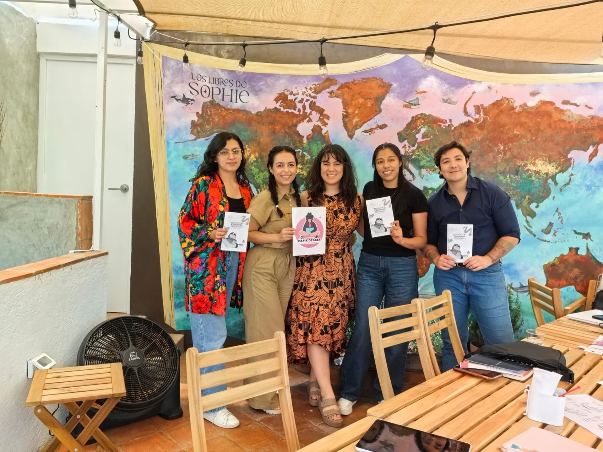 an abstract photo of a curved building with a blue sky in the background